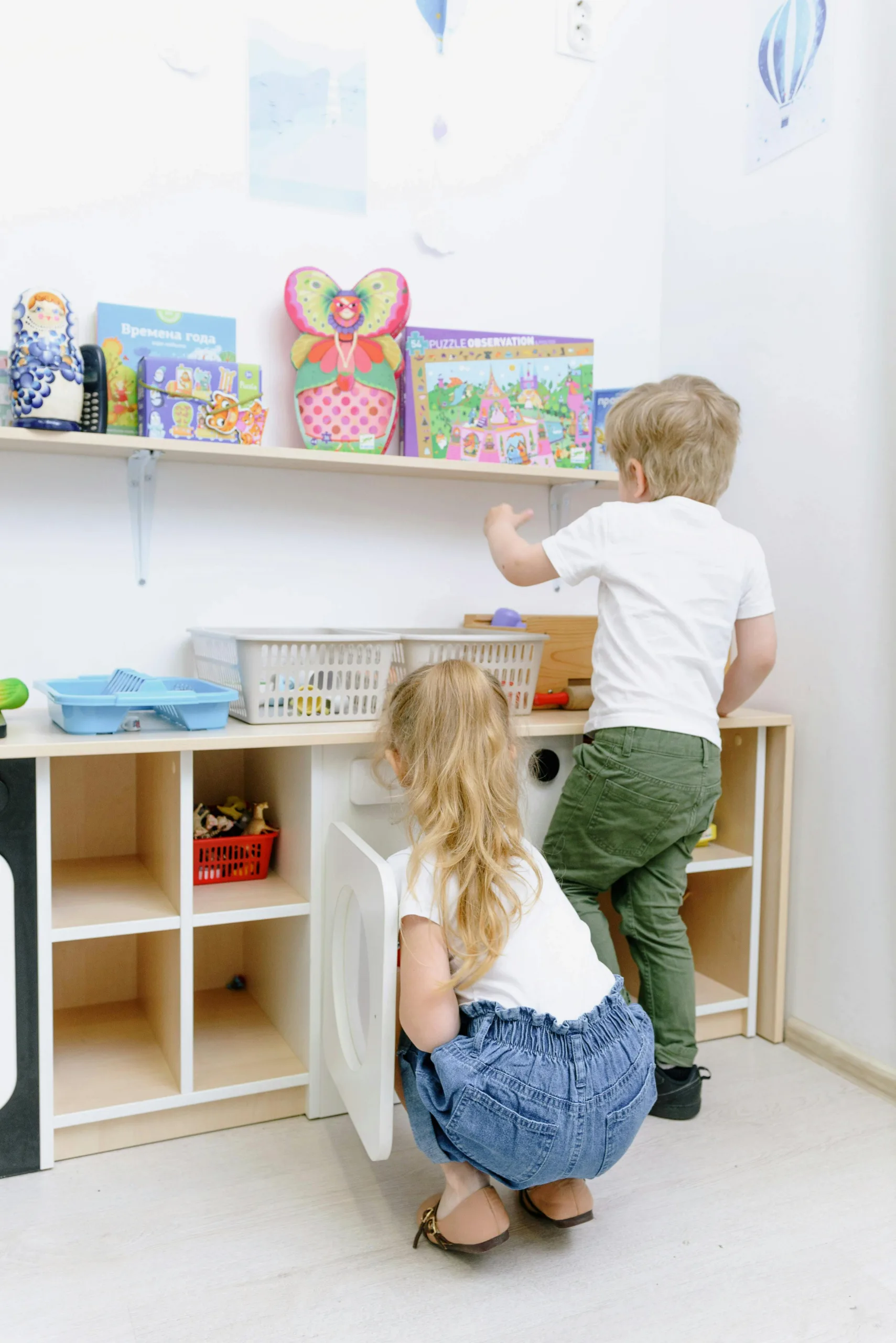 organized-playroom-perimeter-shelving