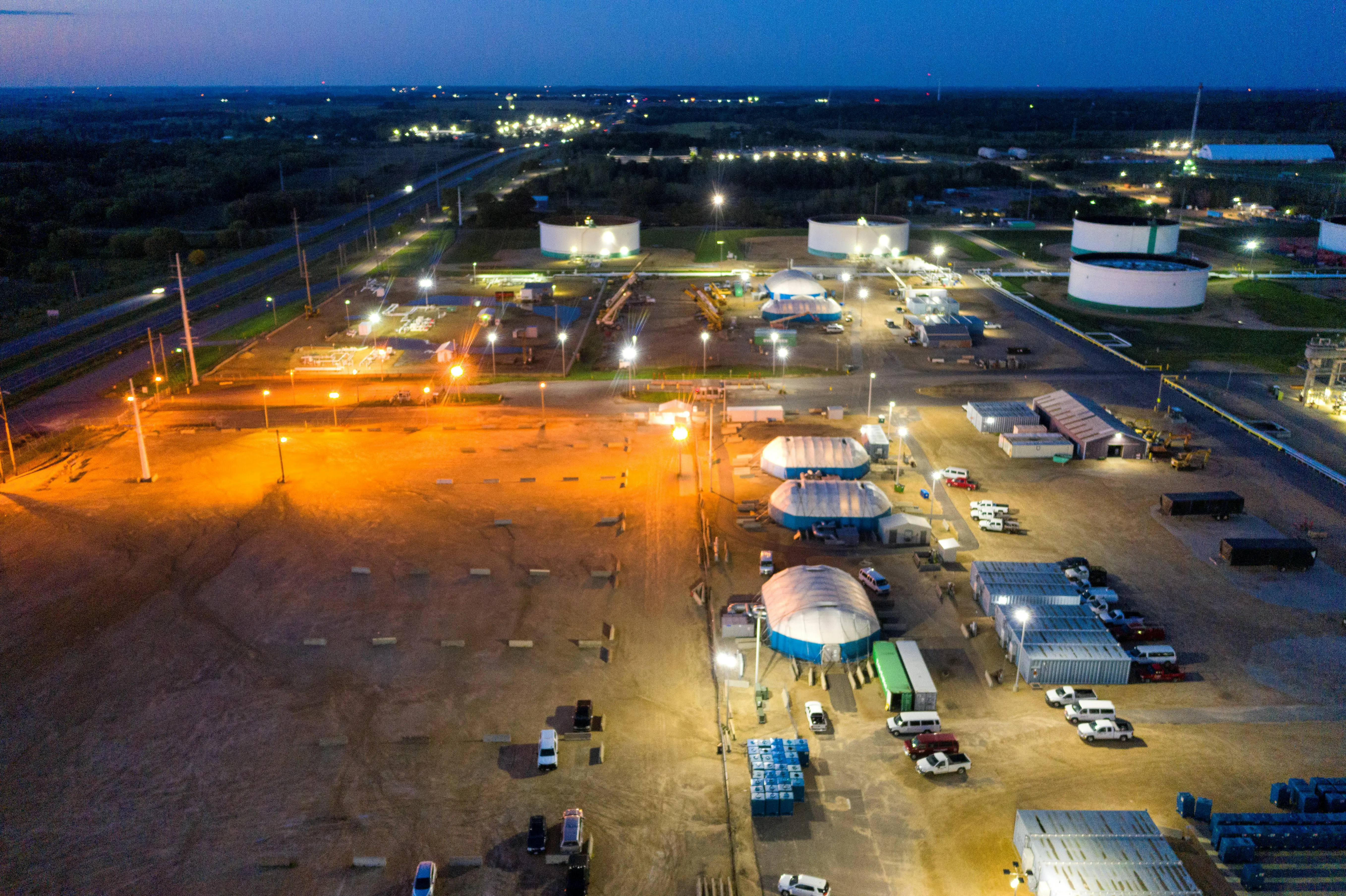 24 hour storage Aerial photograph of a well-lit industrial site in Rosemount, Minnesota at night.