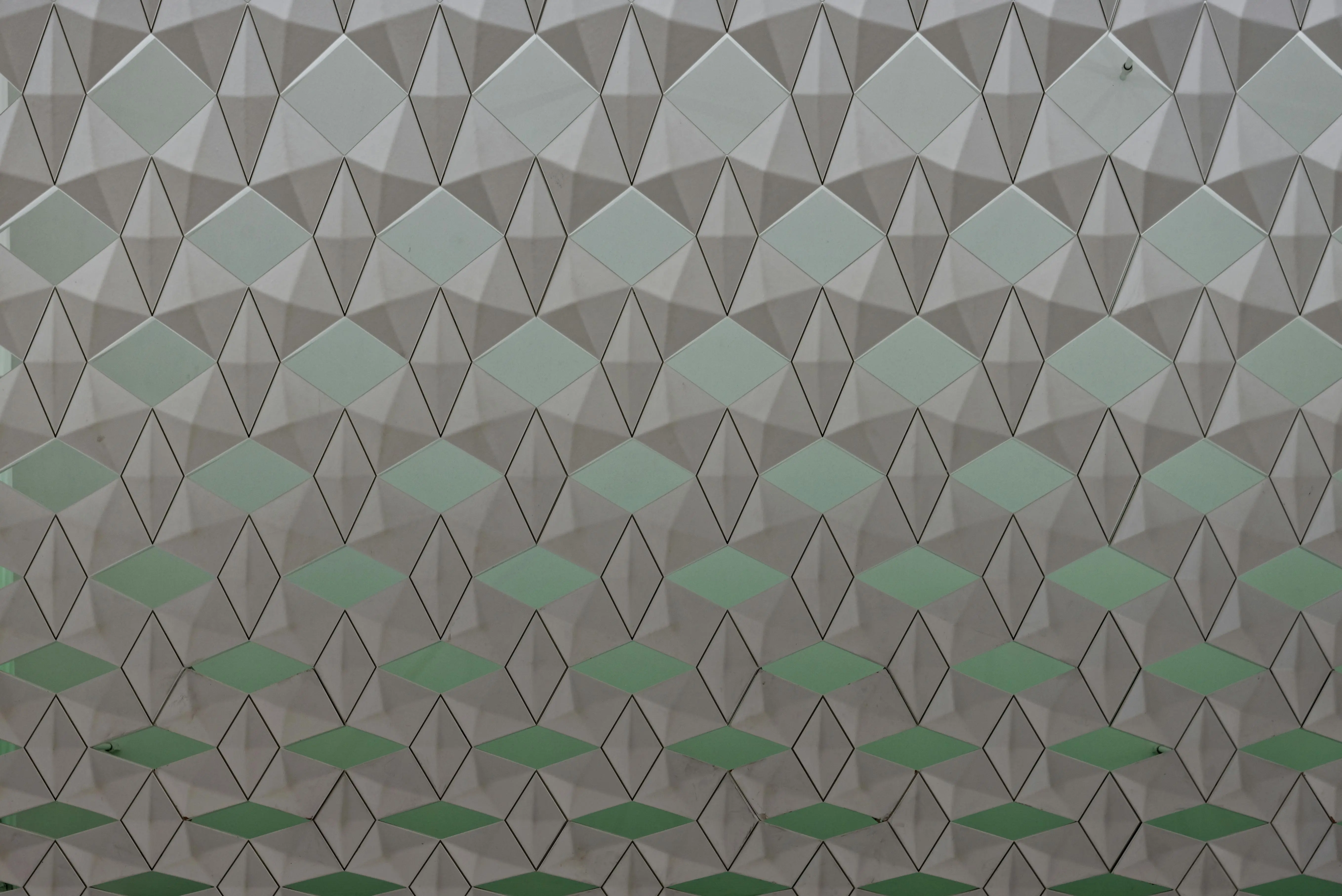 contemporary elegant tile styles Seamless geometric pattern featuring diamond shapes in a soft color gradient.