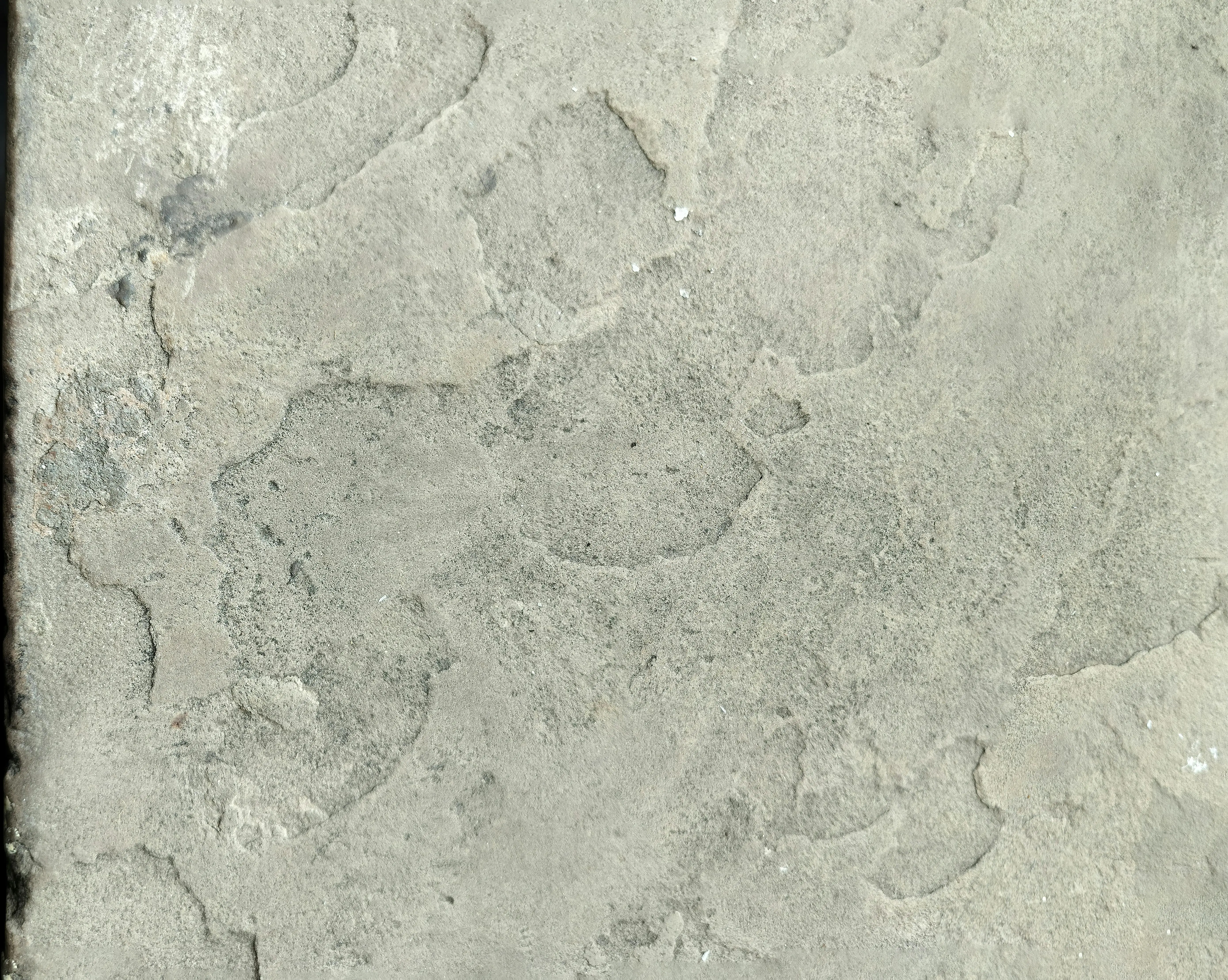 peel and stick stone tile Close-up of a rough textured concrete surface with natural patterns, ideal for backgrounds.