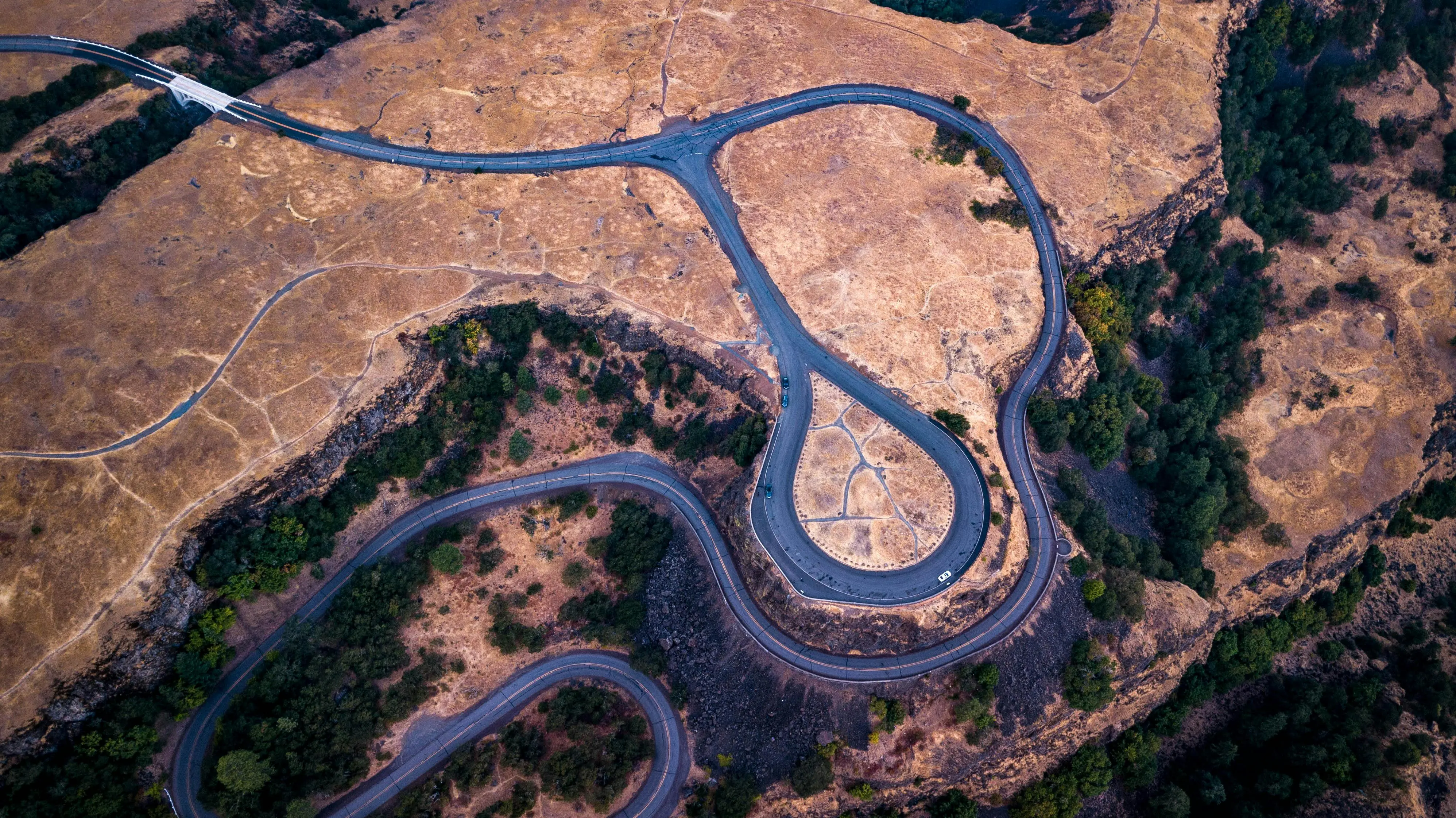 window sill bird feeder Stunning aerial view of a winding road in Mosier, Oregon, showcasing the landscape's natural beauty.