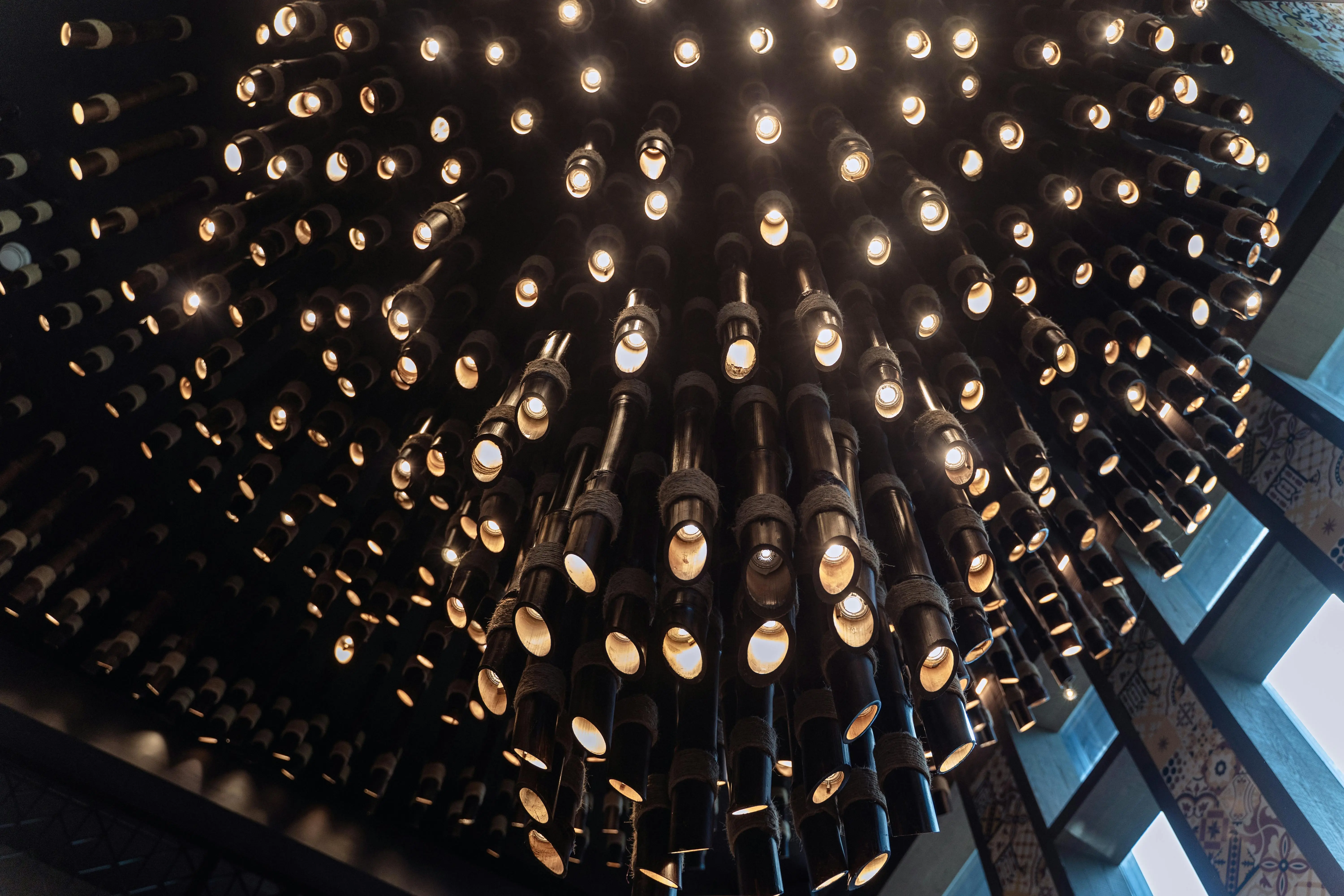 coastal chandelier Artistic design of a chandelier with glowing lights in Dubai, showcasing modern architecture style.