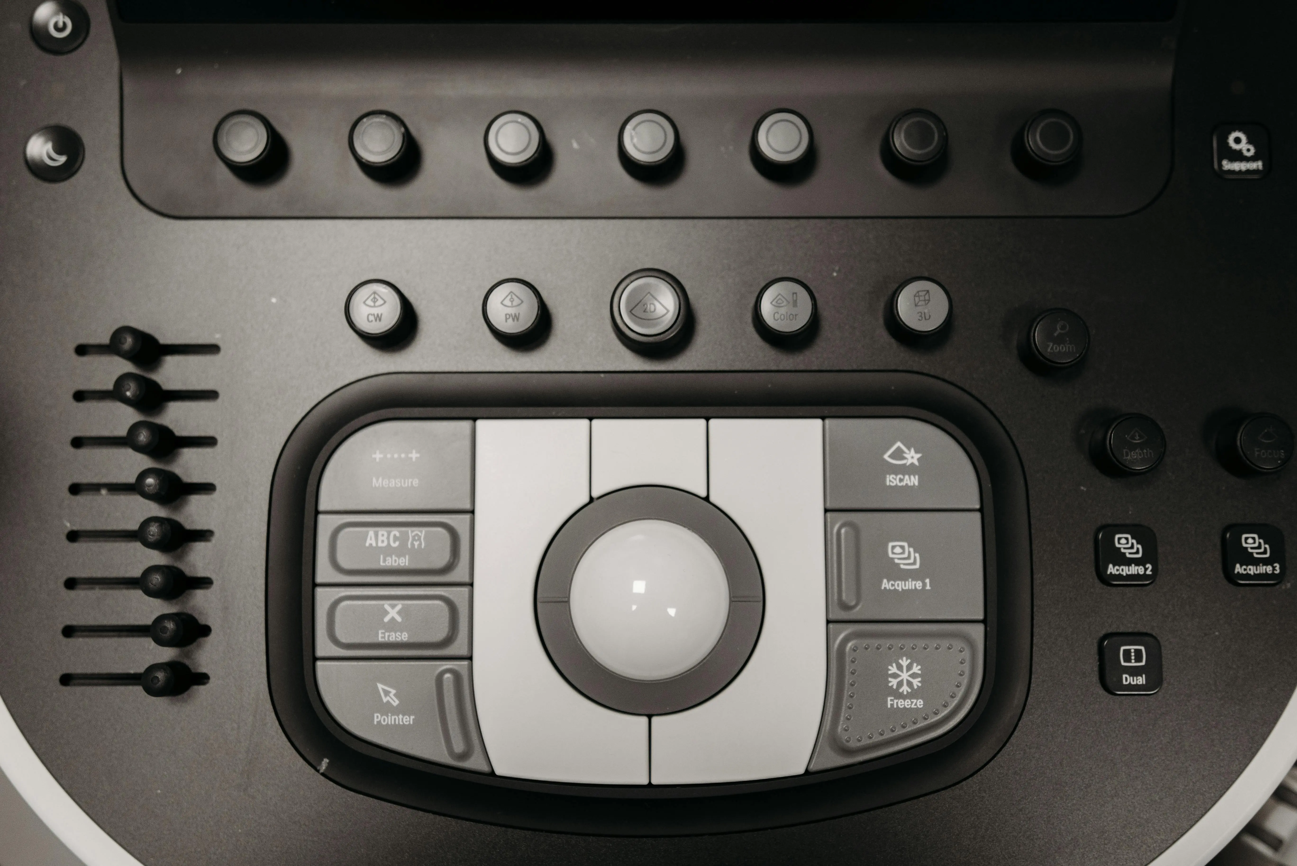 commercial clothes dryer Detailed view of buttons and controls on a medical ultrasound machine for diagnostics.