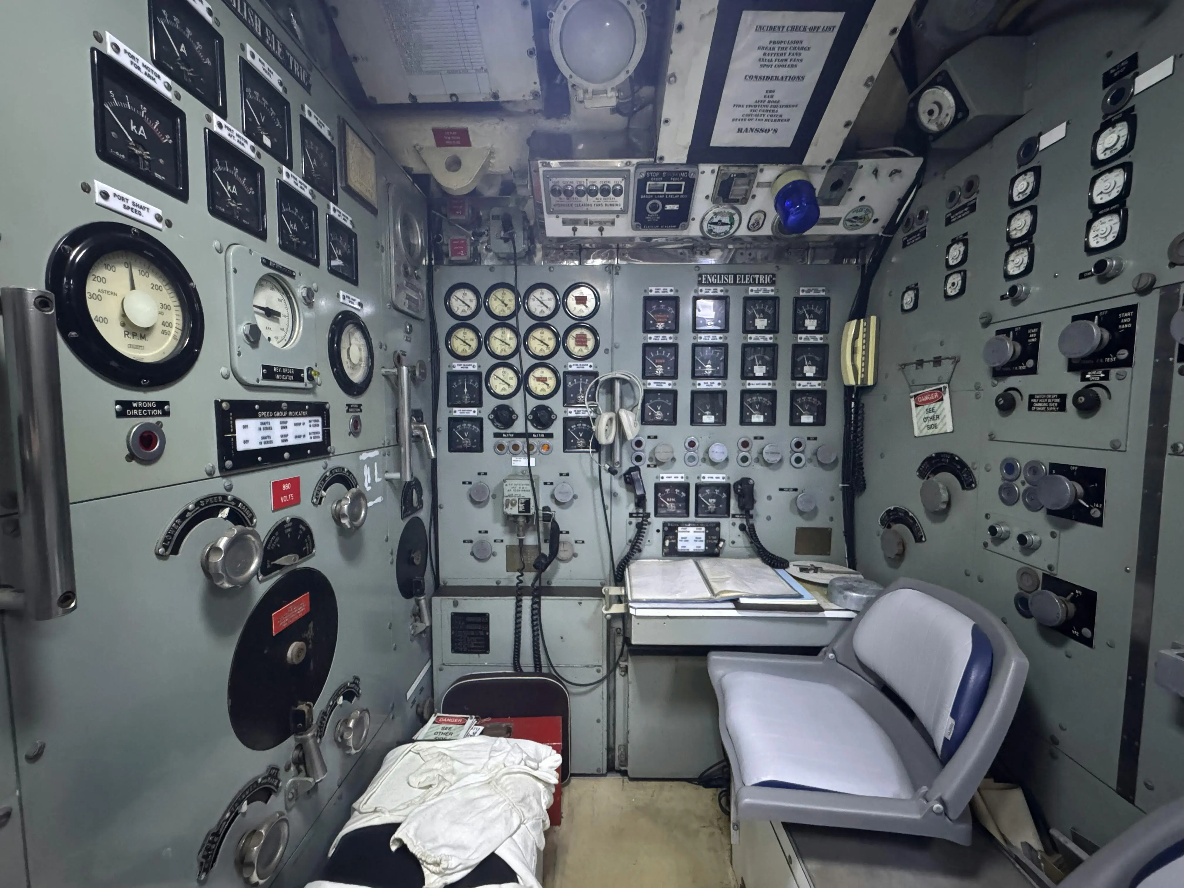 extendable console table A vintage control room filled with dials, gauges, and machinery detailing industrial equipment.