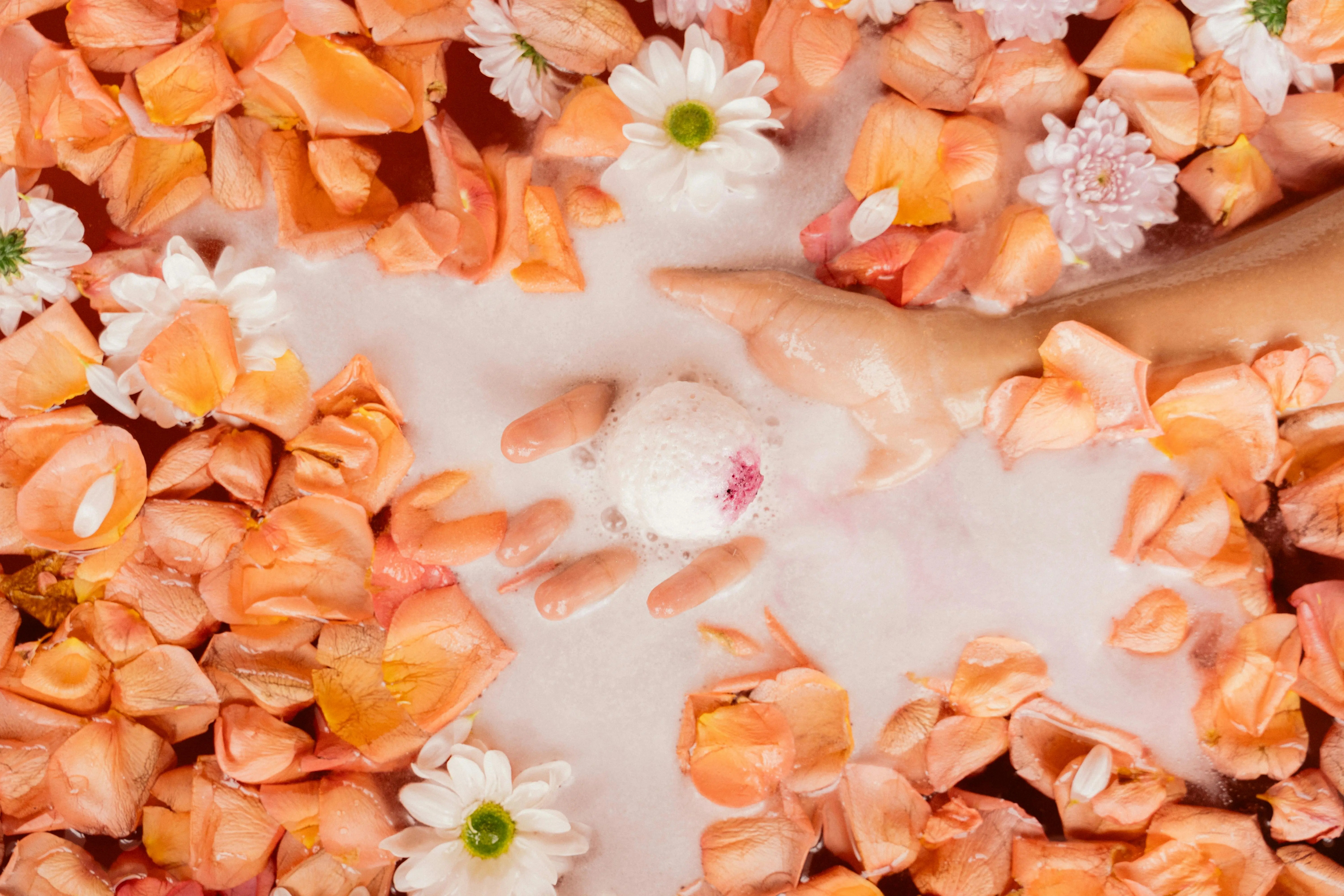 fragrance free laundry detergent Relaxing bath scene with colorful petals and foam, ideal for wellness and spa themes.
