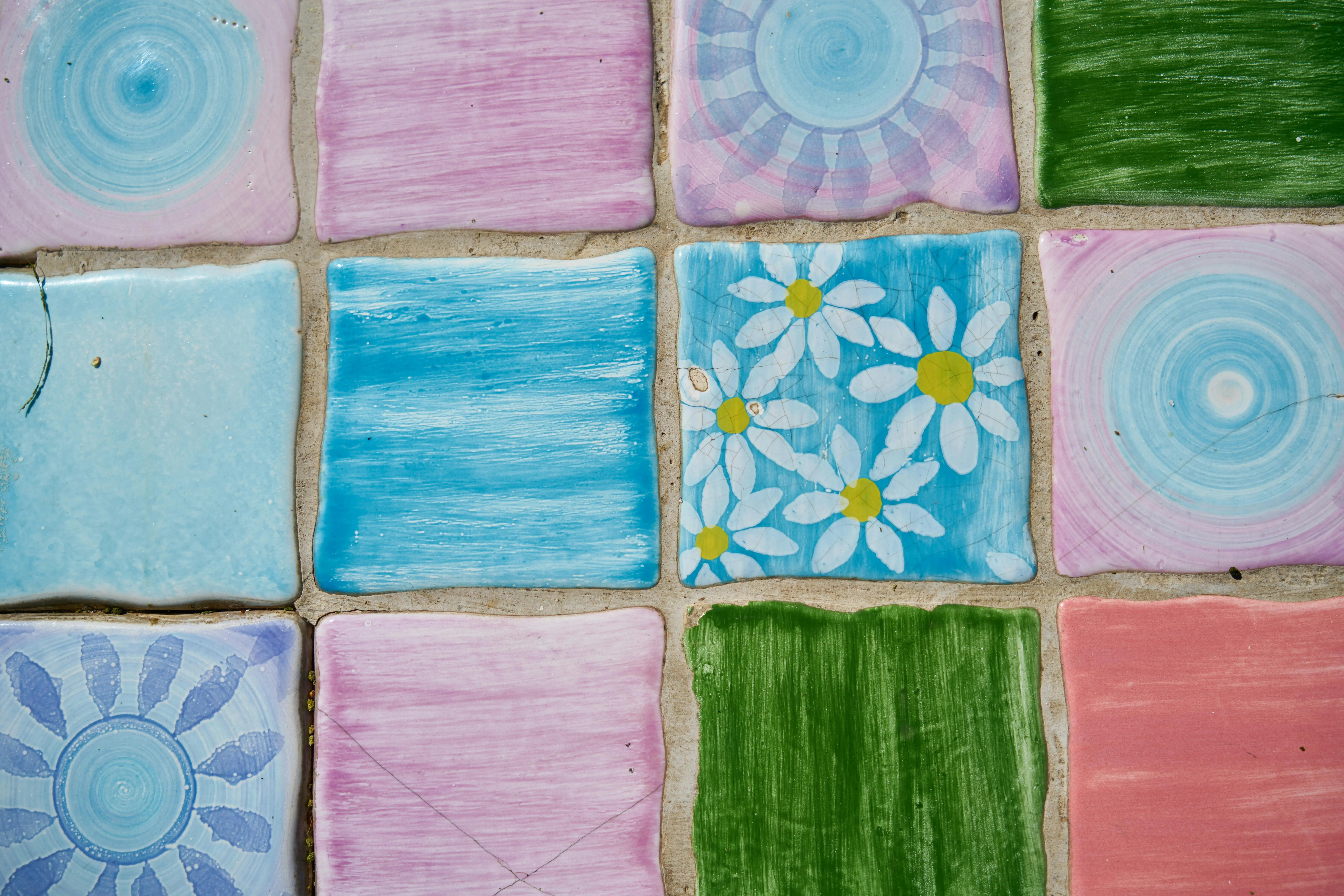 floral tiles Vibrant abstract tiles featuring floral designs and pastel colors for creative spaces.