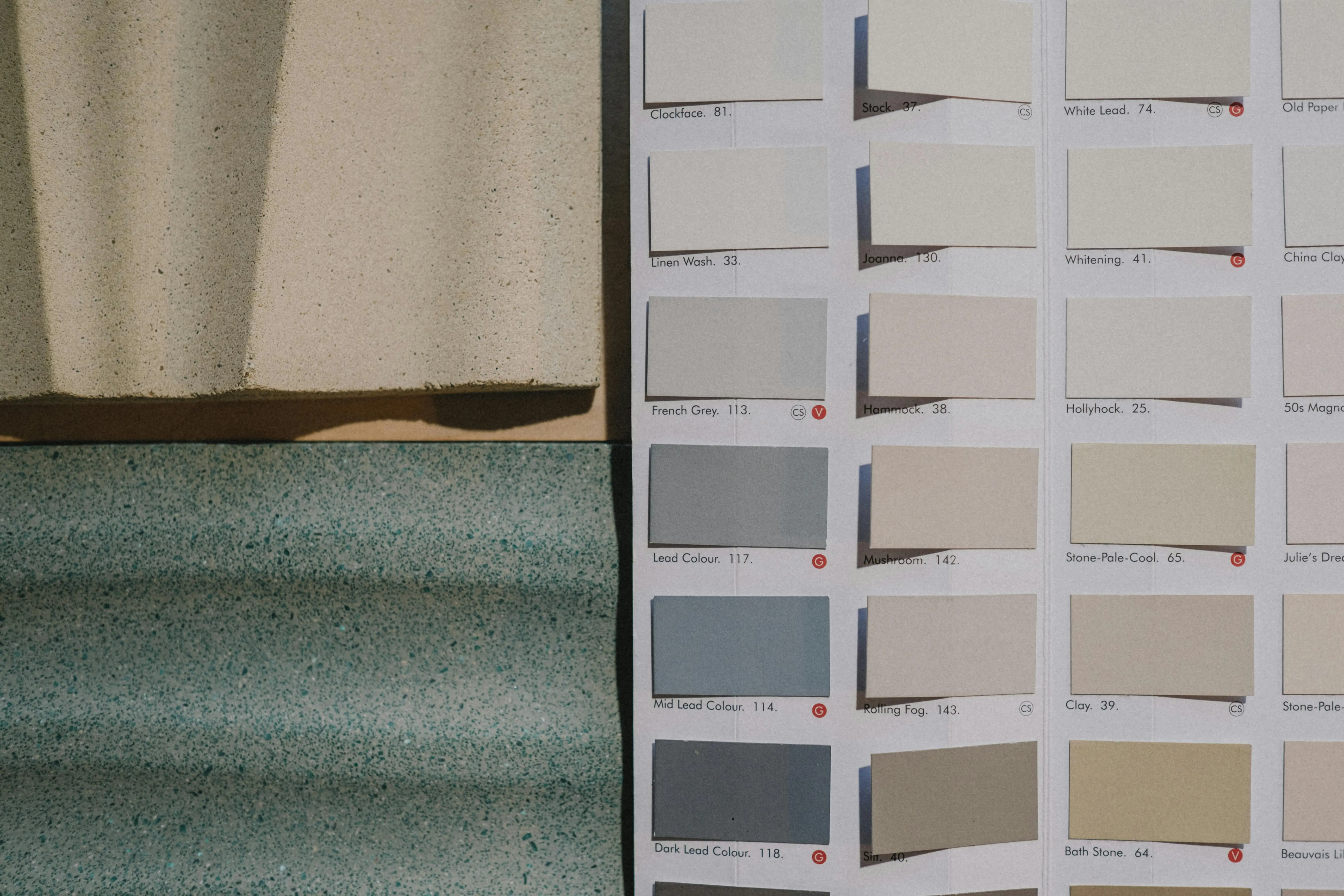 oak cabinets white A detailed view of paint color swatches alongside textured material samples for design inspiration.