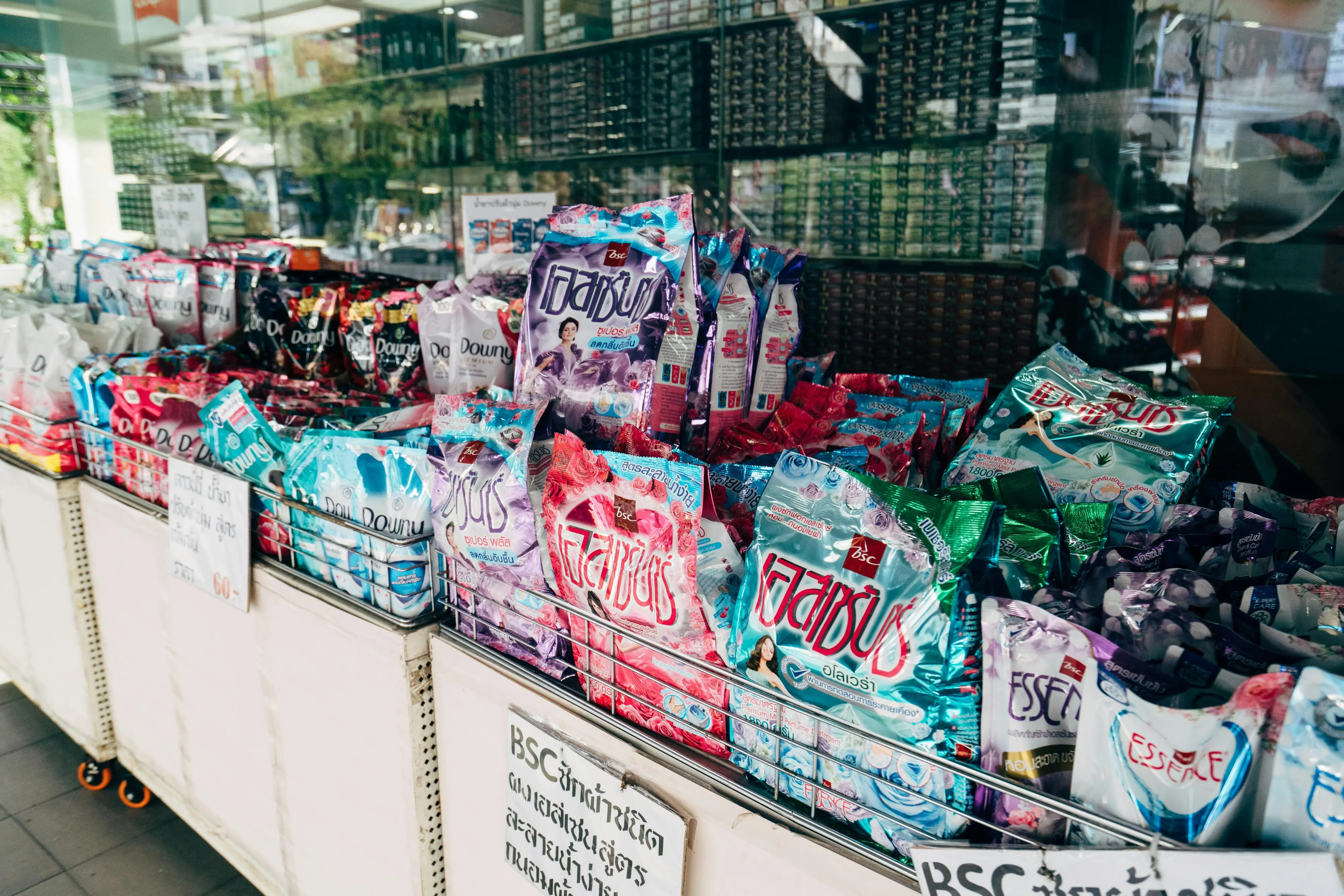 diy laundry detergent 3 ingredients Colorful display of various laundry detergent brands in a retail store setting.