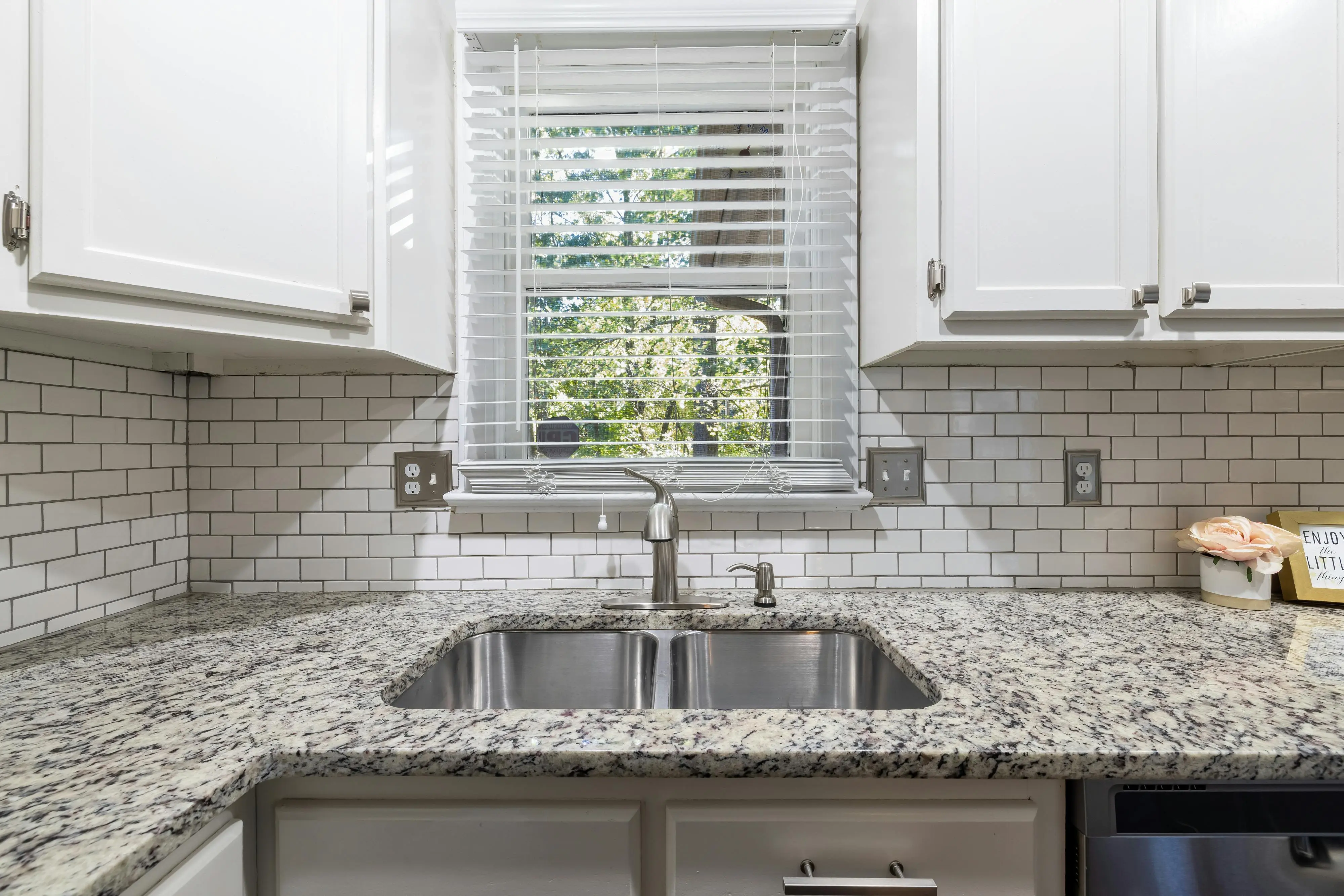 get rid of calcium deposit marks sink Spacious kitchen showcasing sleek cabinets, granite countertop, and a stainless steel sink.