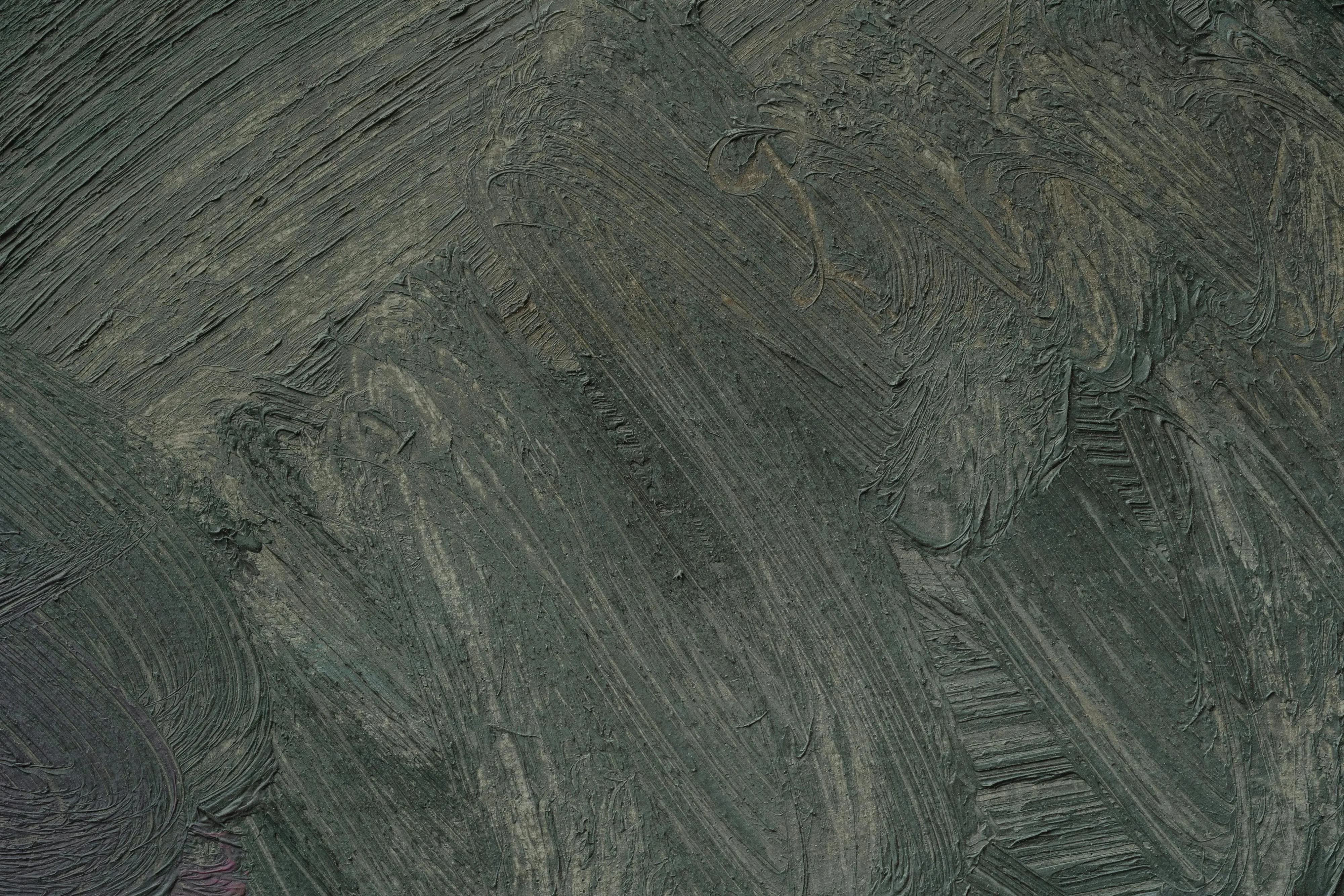 dark gray paint Close-up view of textured gray abstract painting with brushstrokes on canvas.