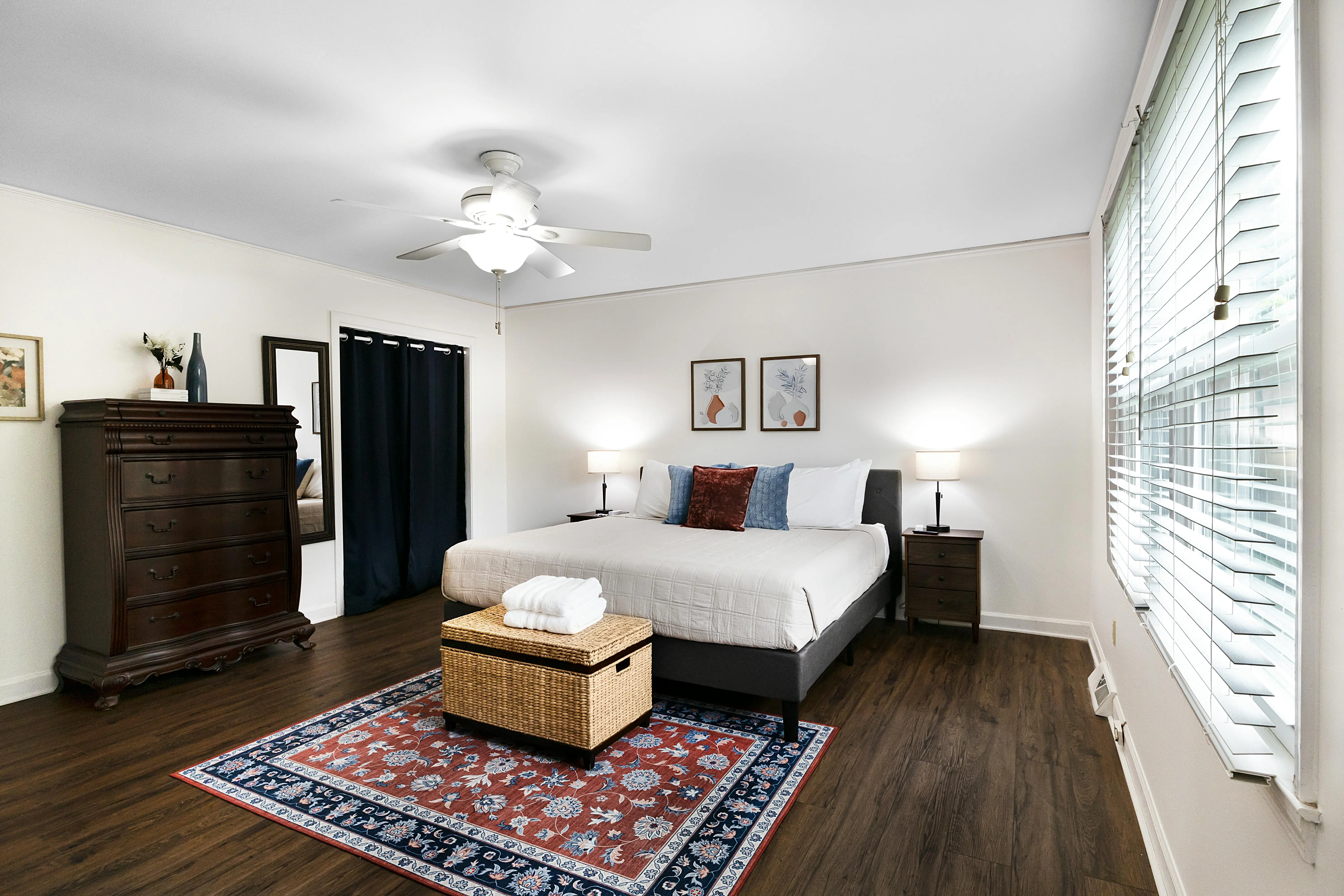 king platform bed with storage A bright, spacious bedroom with stylish decor and natural light. Ideal for real estate or lifestyle content.