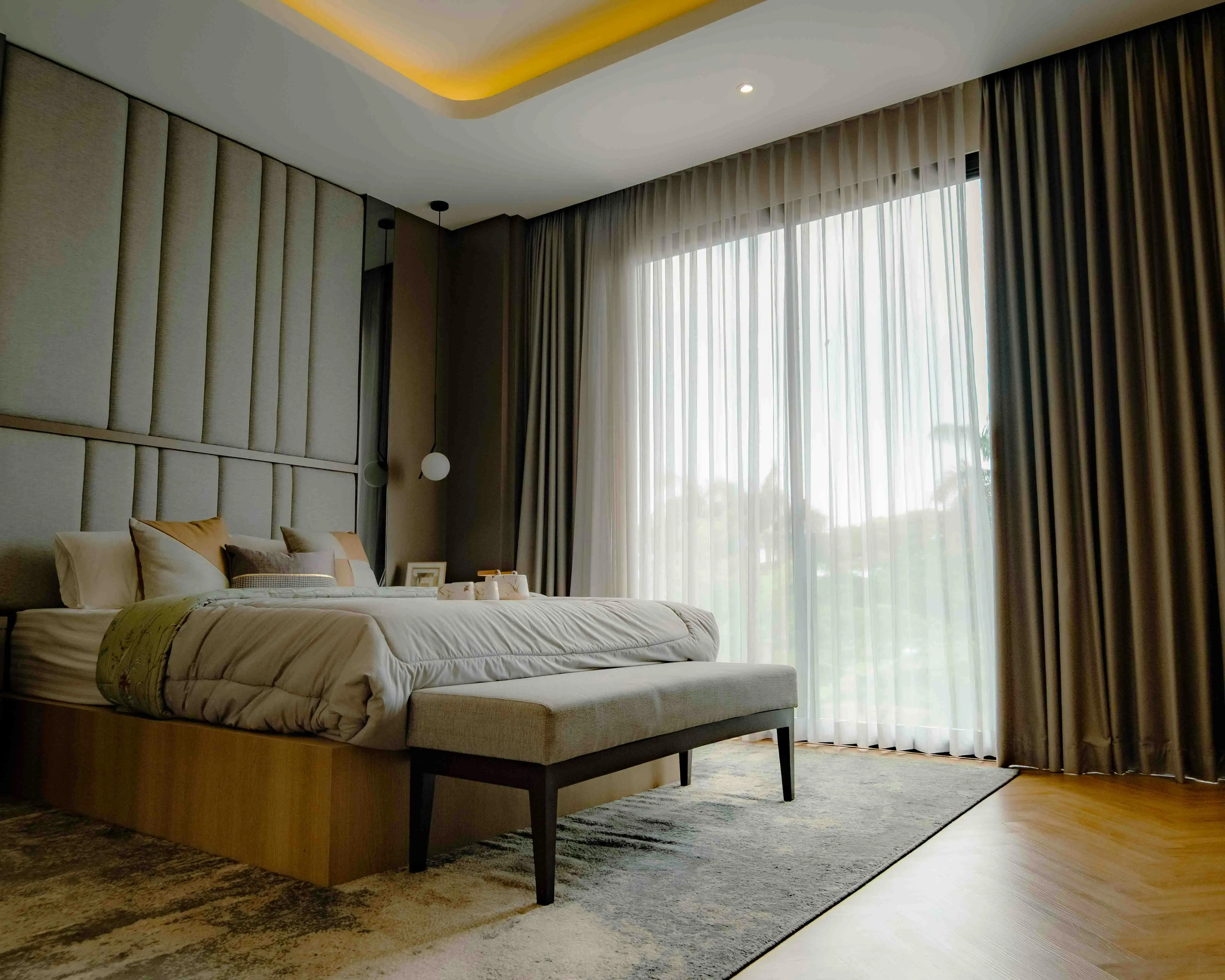king platform bed with storage Contemporary bedroom in Jakarta with elegant design and abundant natural light.