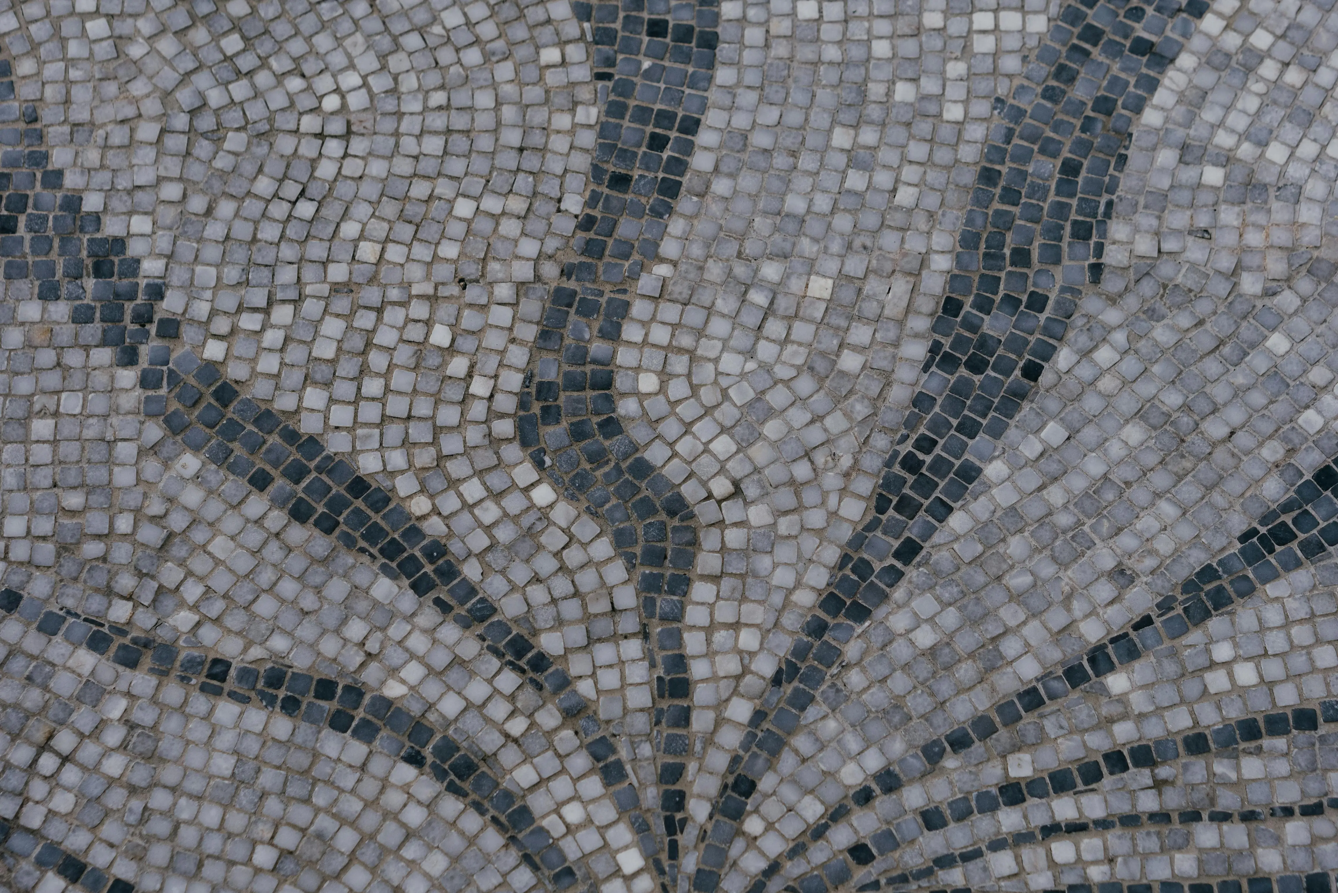 glass on tile Detailed view of a decorative mosaic tile pattern with geometric design.