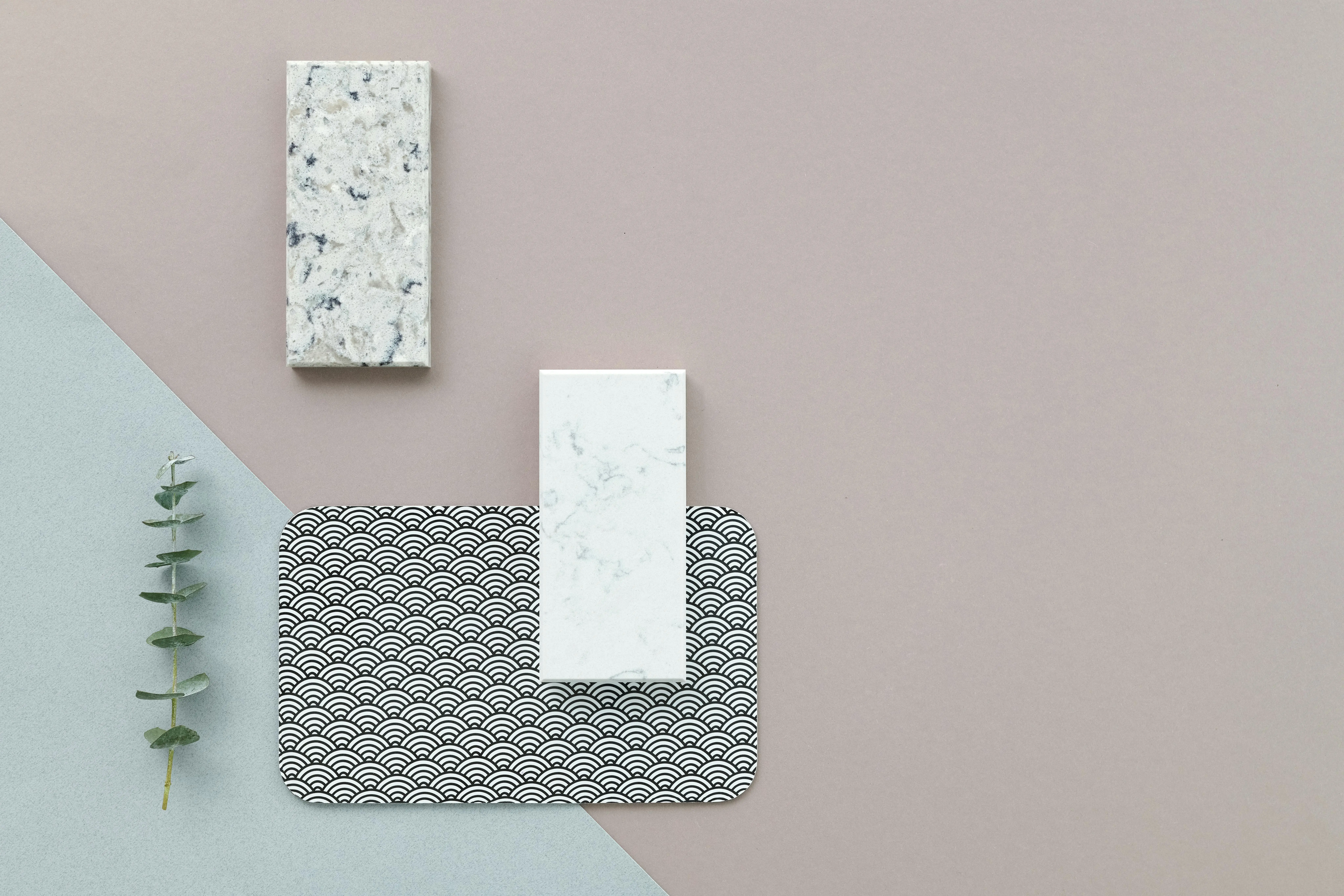 corner cabinets for kitchen A minimalist flat lay of marble samples and design elements on a textured background.