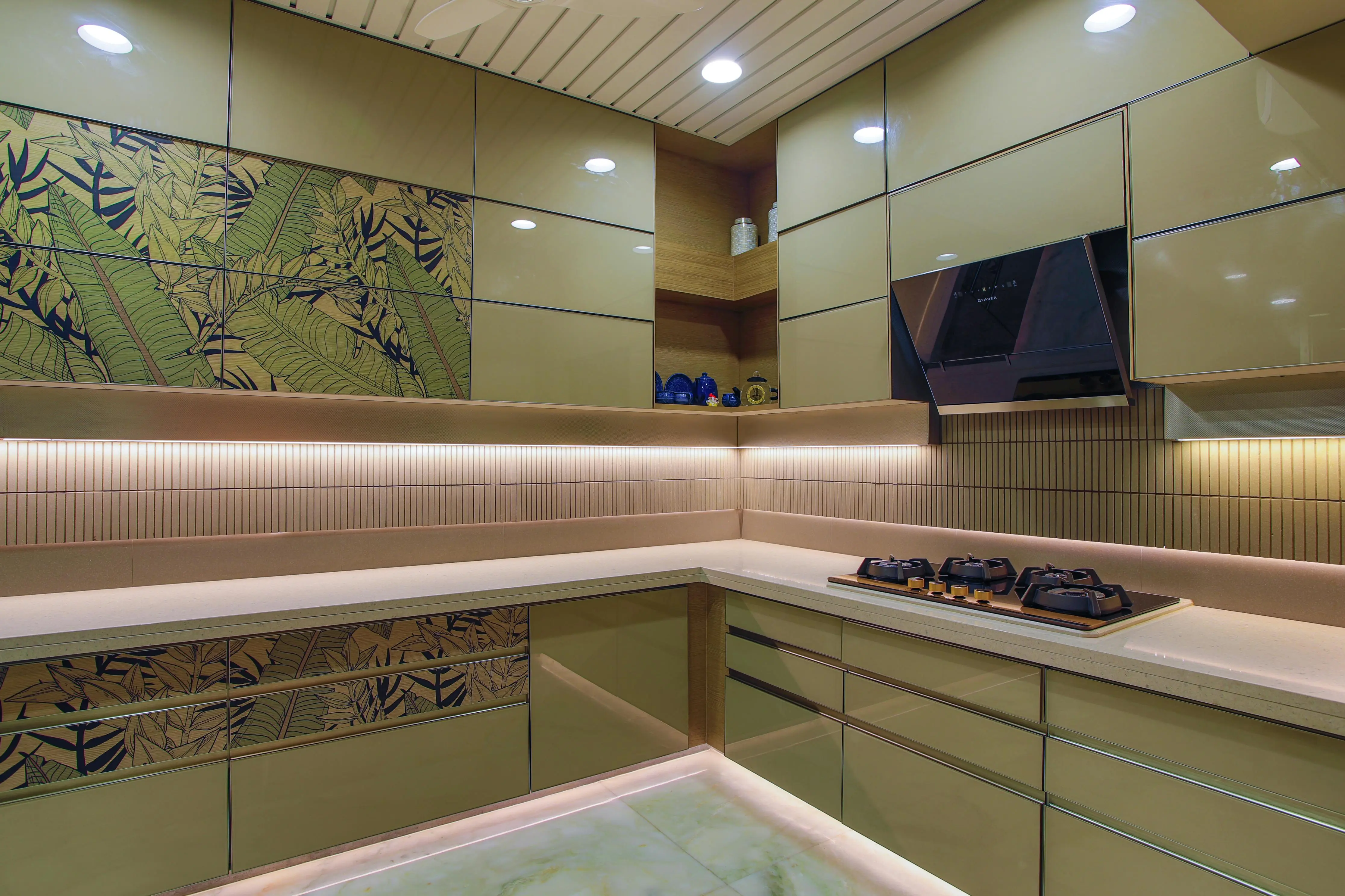 corner cabinets for kitchen Sleek kitchen design featuring green cabinets, hob, and floral accents.