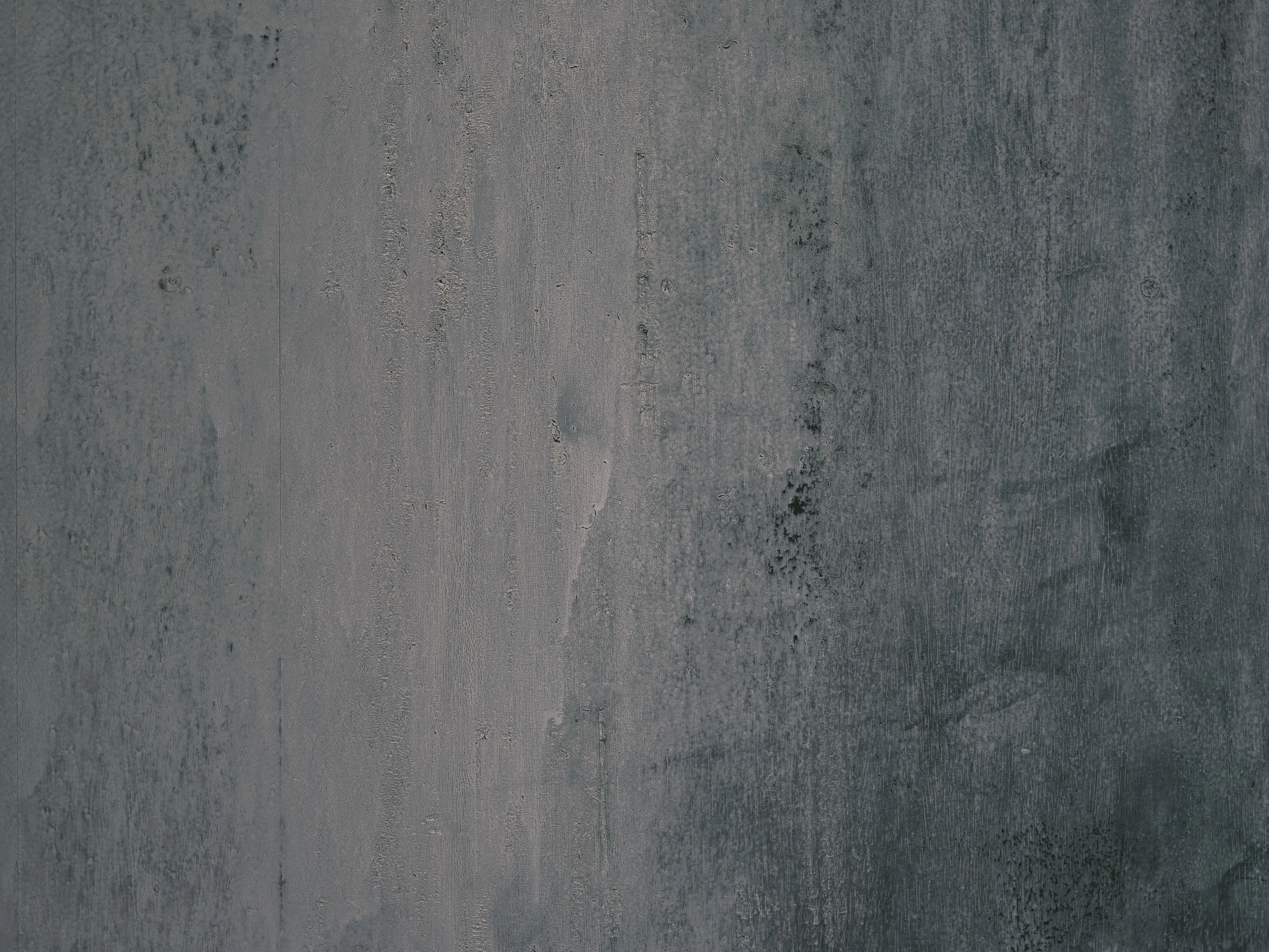 paint for cement floor A dark, weathered concrete wall texture, perfect for backgrounds and design projects.