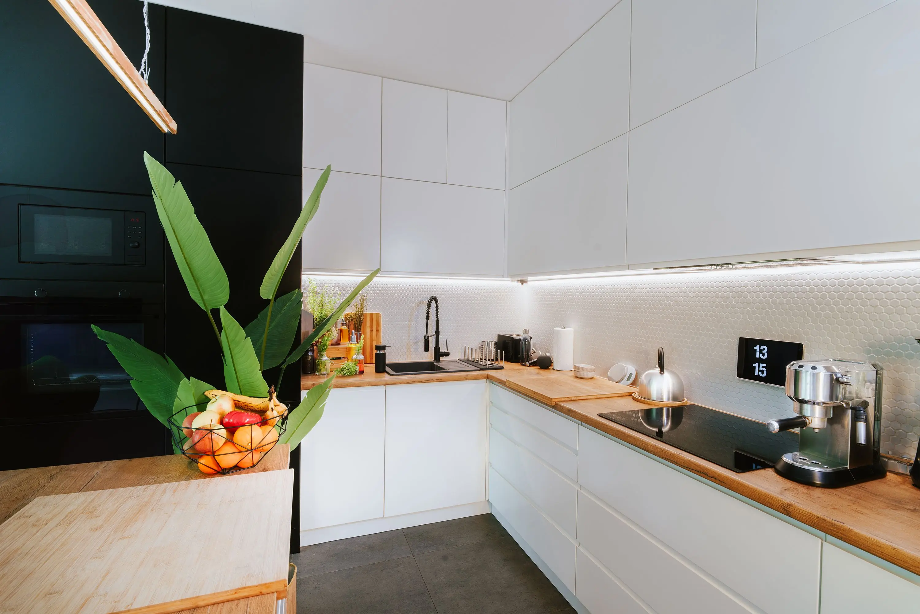 modern cabinet knobs Sleek kitchen featuring smart tech and minimalist design, perfect for modern homes.
