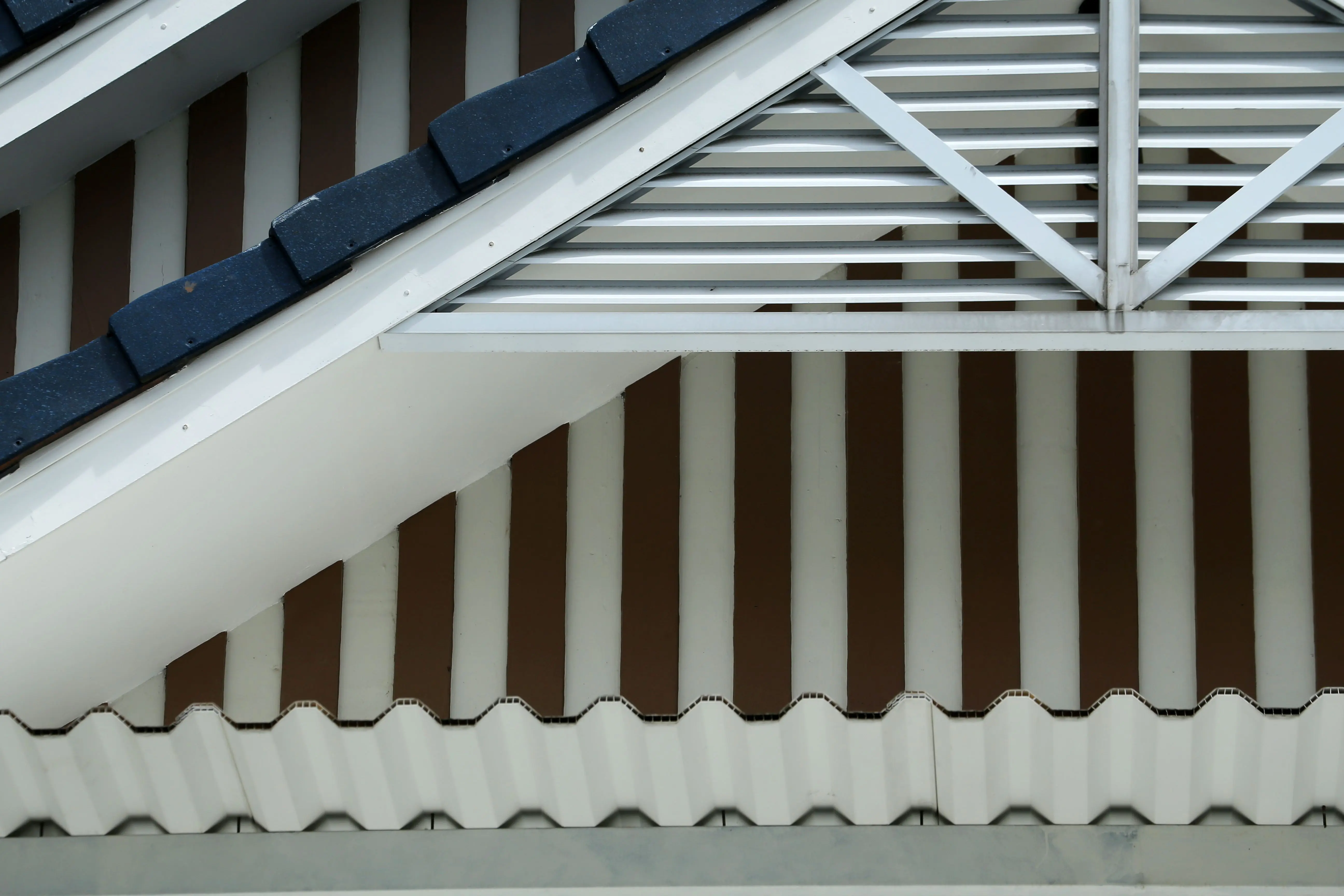 steel roof coating Detailed view of architectural roofing design featuring steel trusses and tiled patterns.