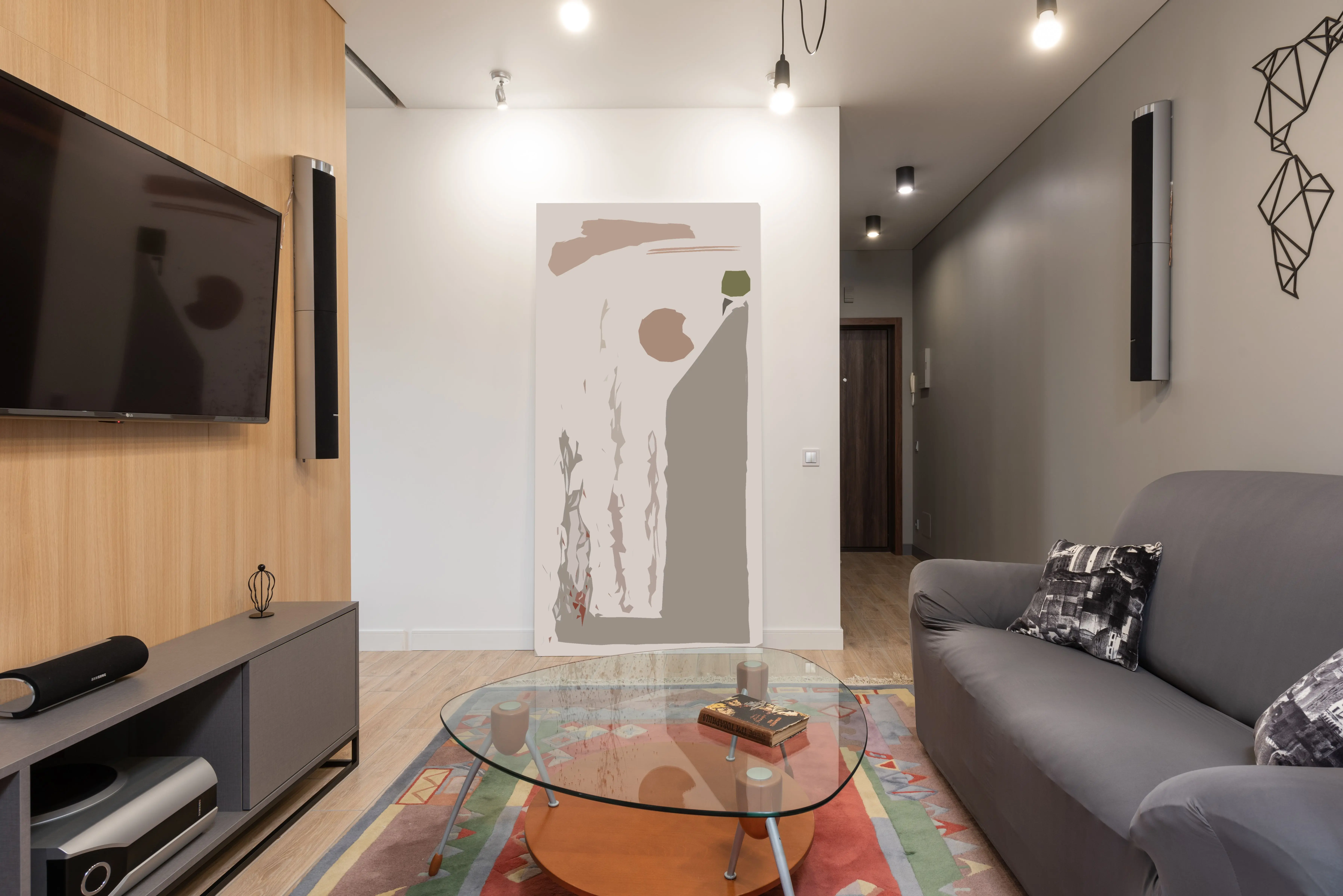 abstract art prints Modern apartment interior with sofa with pillows near glass table on carpet near cabinet and TV with speakers on wall near lamp on ceiling and painting