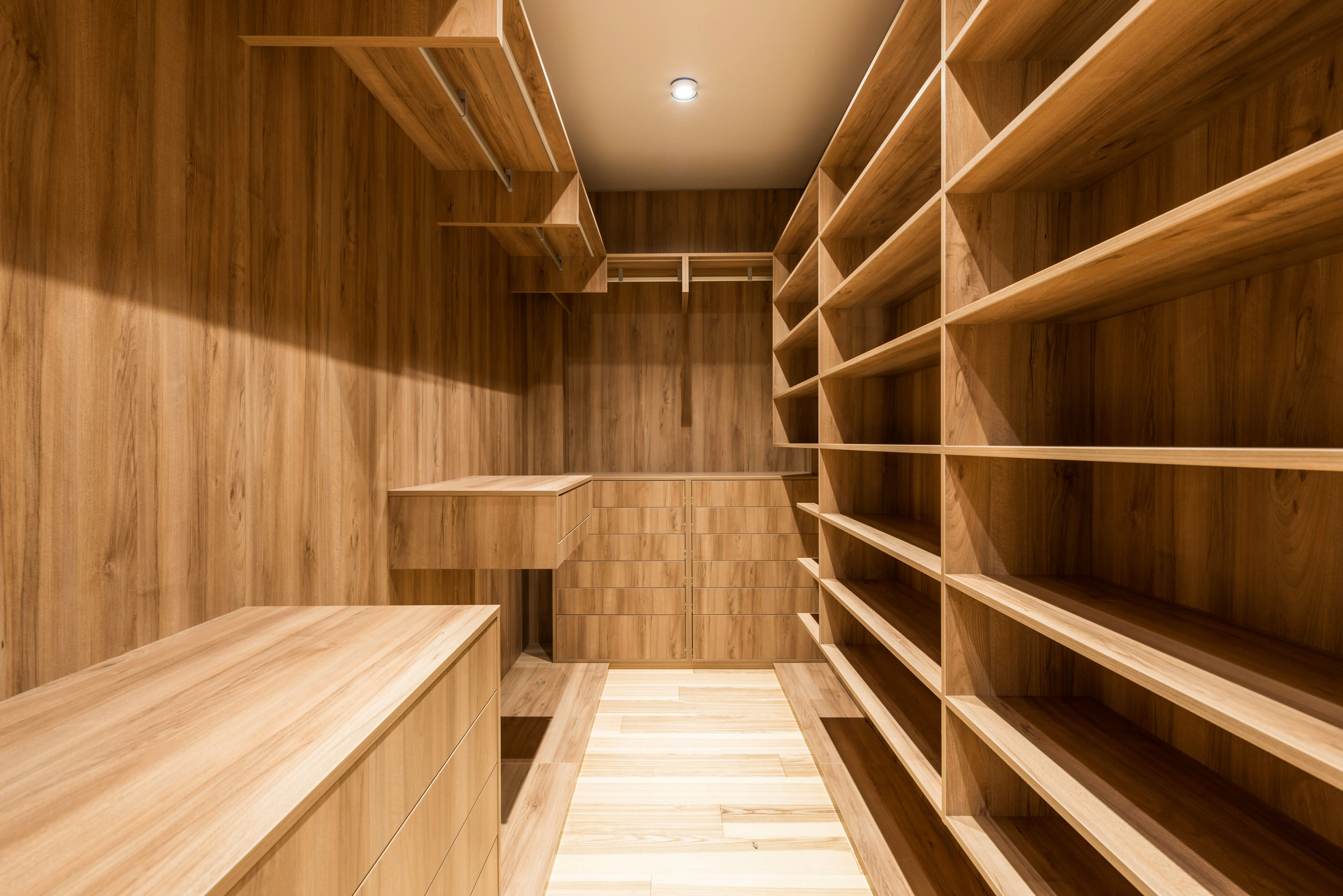 closet rod height Creative design of wooden wardrobe with empty shelves and parquet under shiny lamp in house