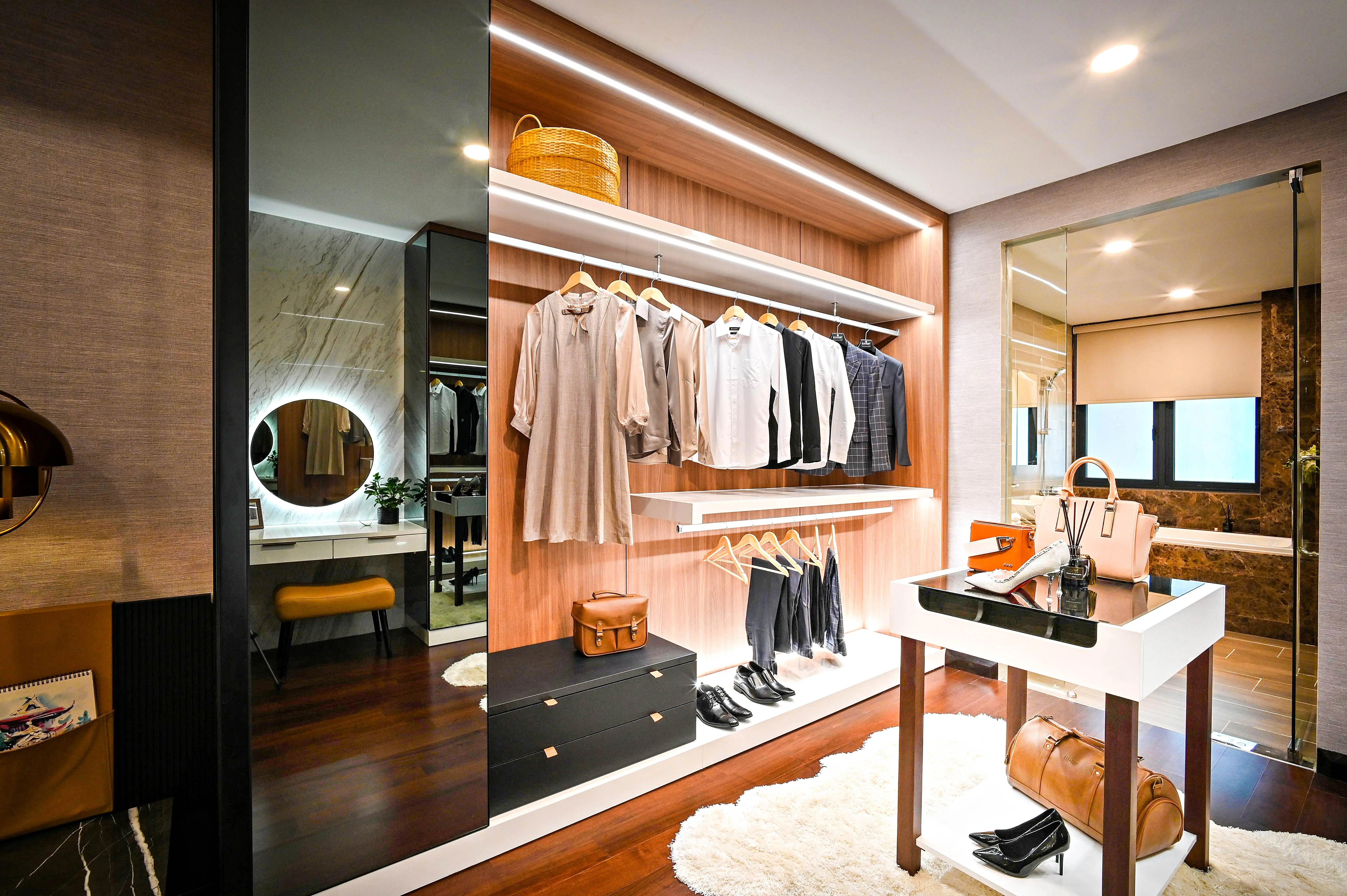 wardrobe closet with drawers Elegant and organized walk-in closet featuring stylish clothing and accessories.