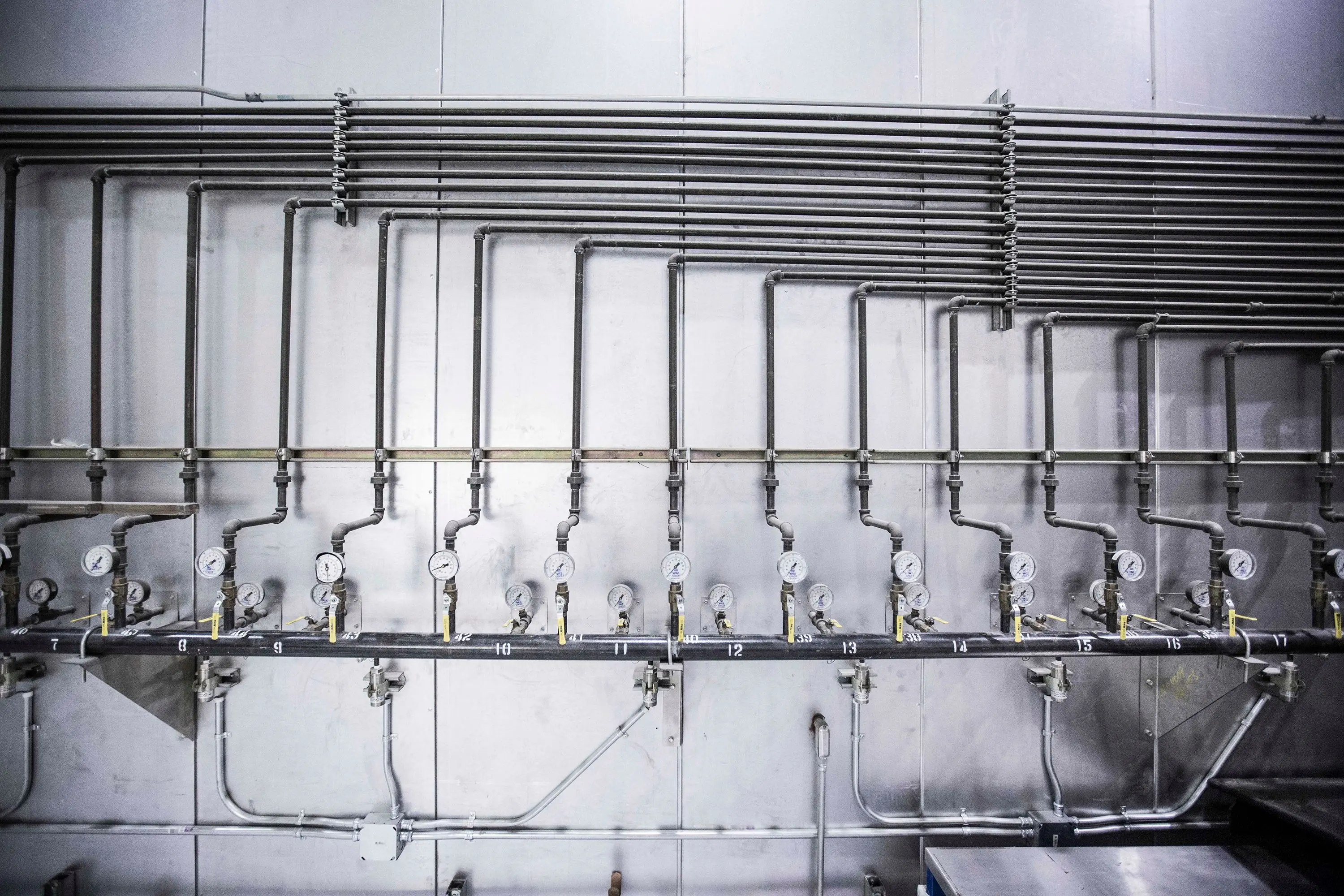 dryer does not heat Detailed view of an industrial plumbing system featuring multiple pressure gauges and steel pipes.