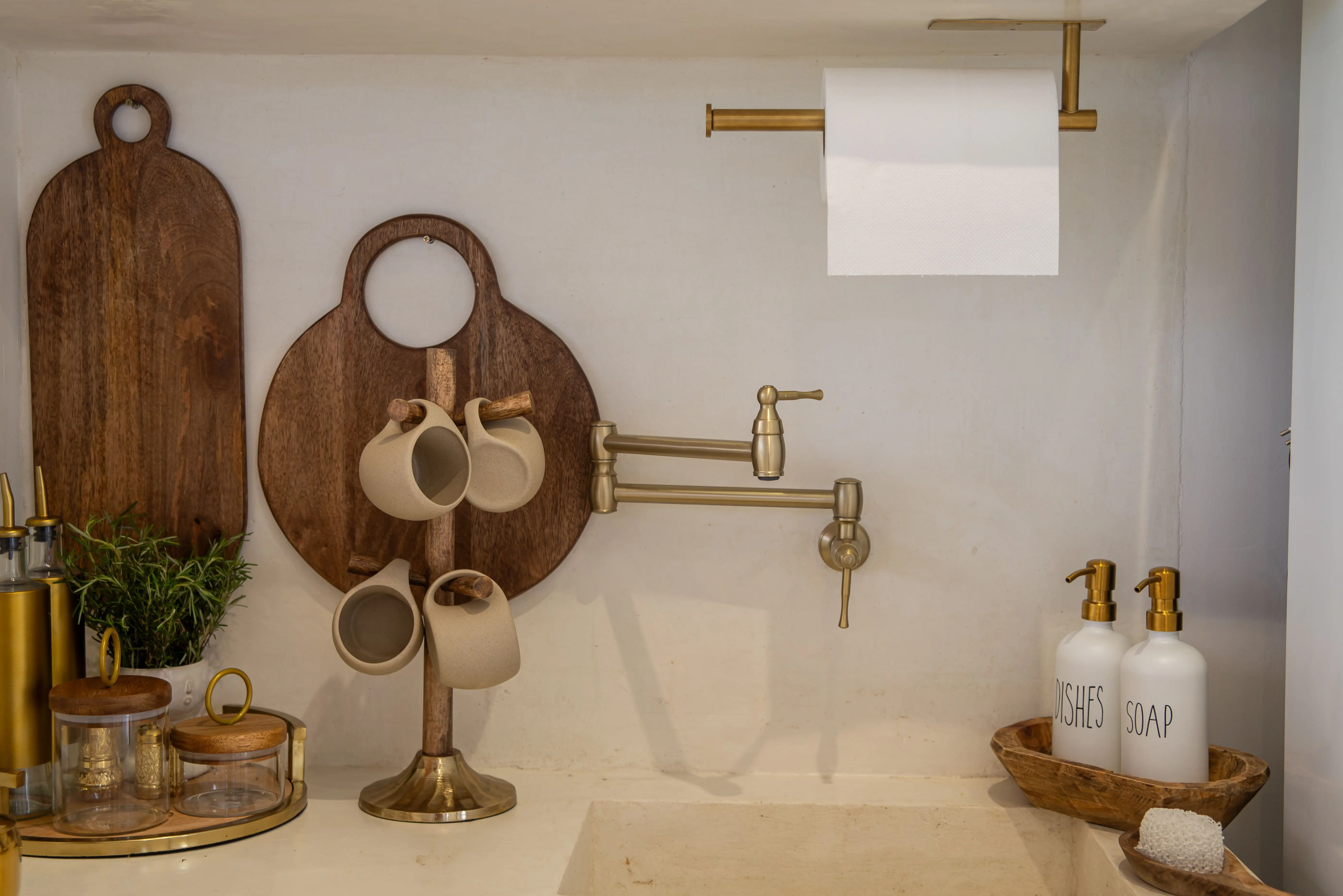 under sink cabinet A modern kitchen setup with wooden kitchenware and stylish accessories, perfect for contemporary interiors.