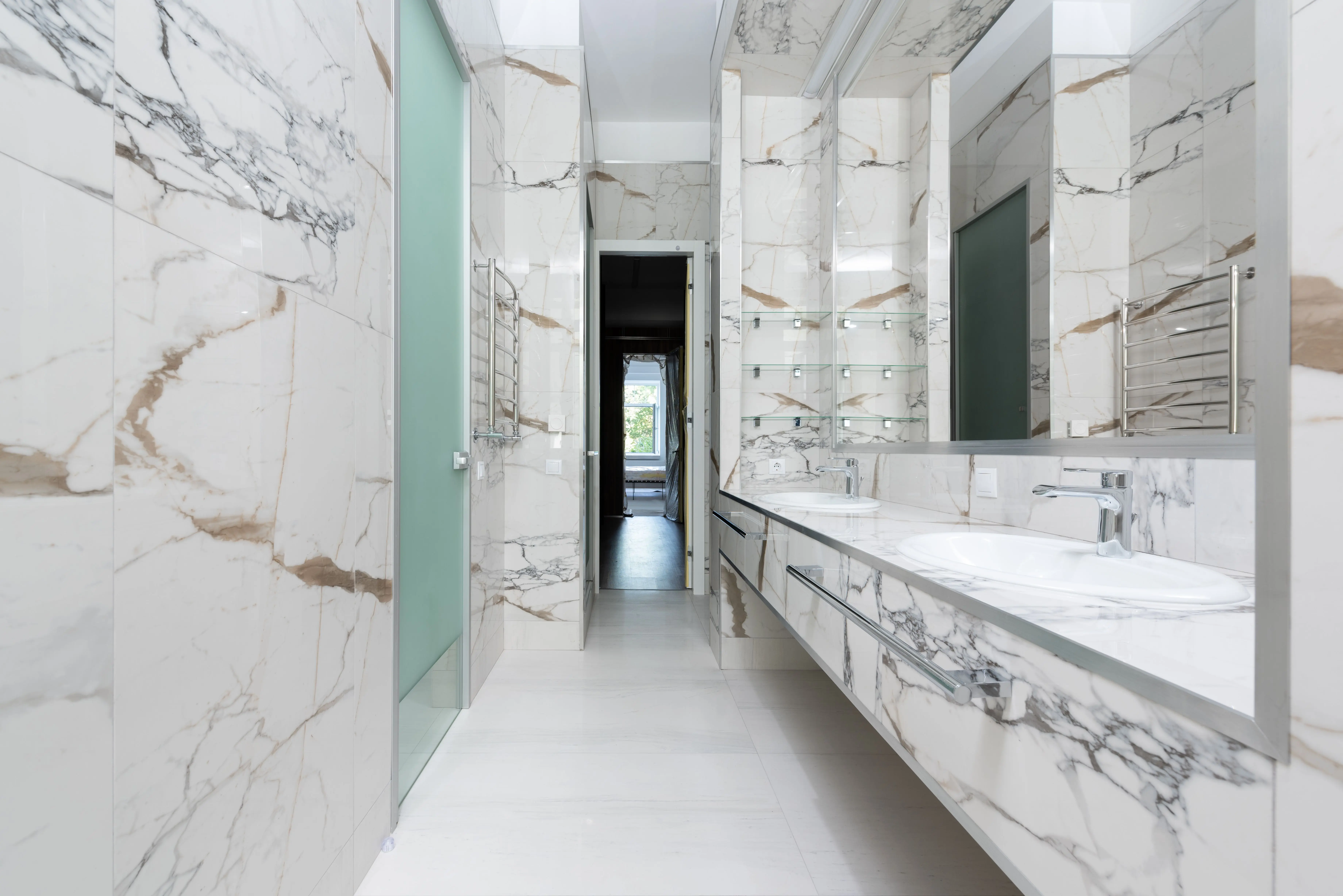 double bathroom vanities Elegant marble bathroom featuring a modern double vanity design.