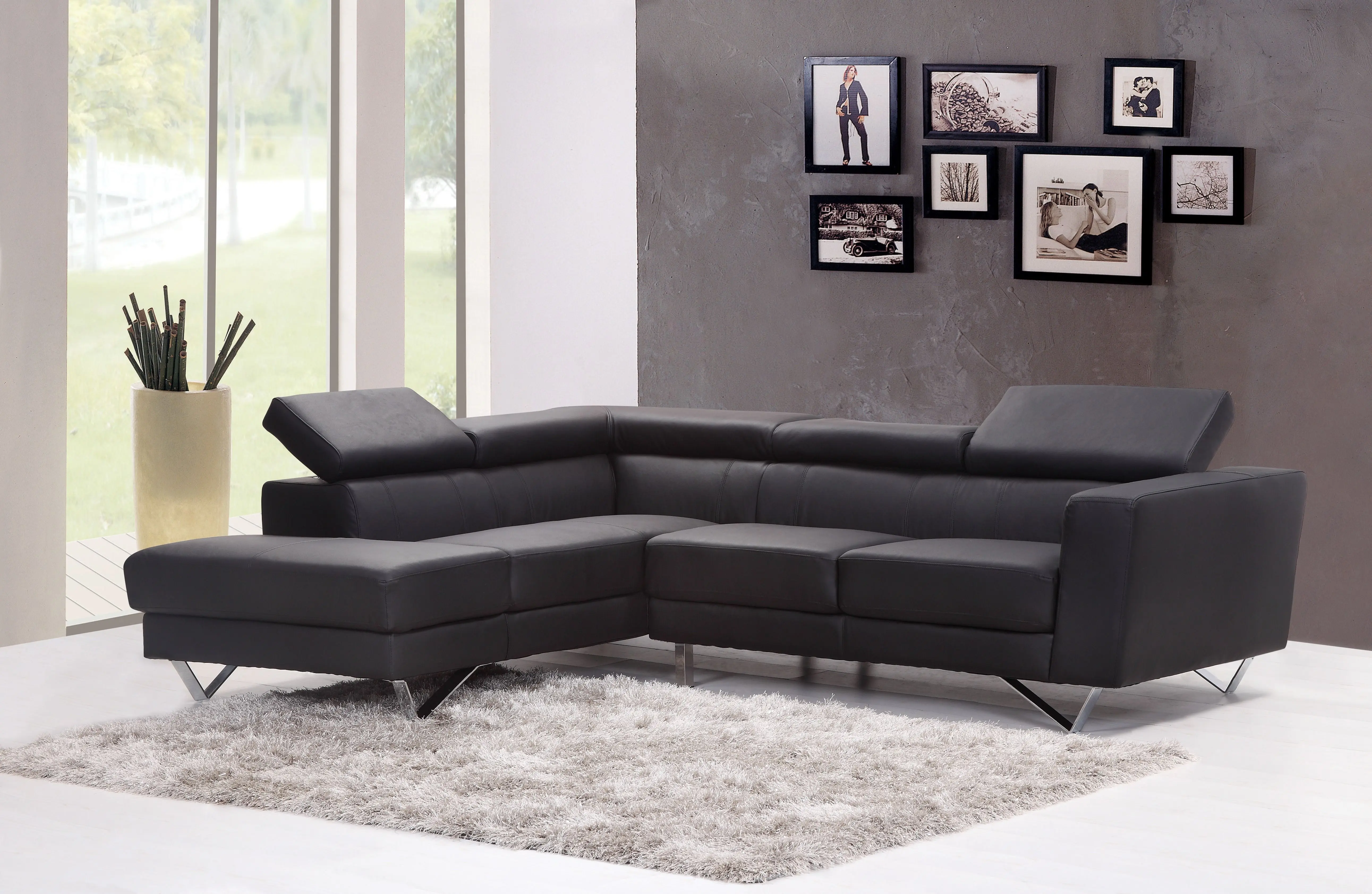 sectional green Contemporary living room featuring a sleek black sectional sofa and chic wall art.