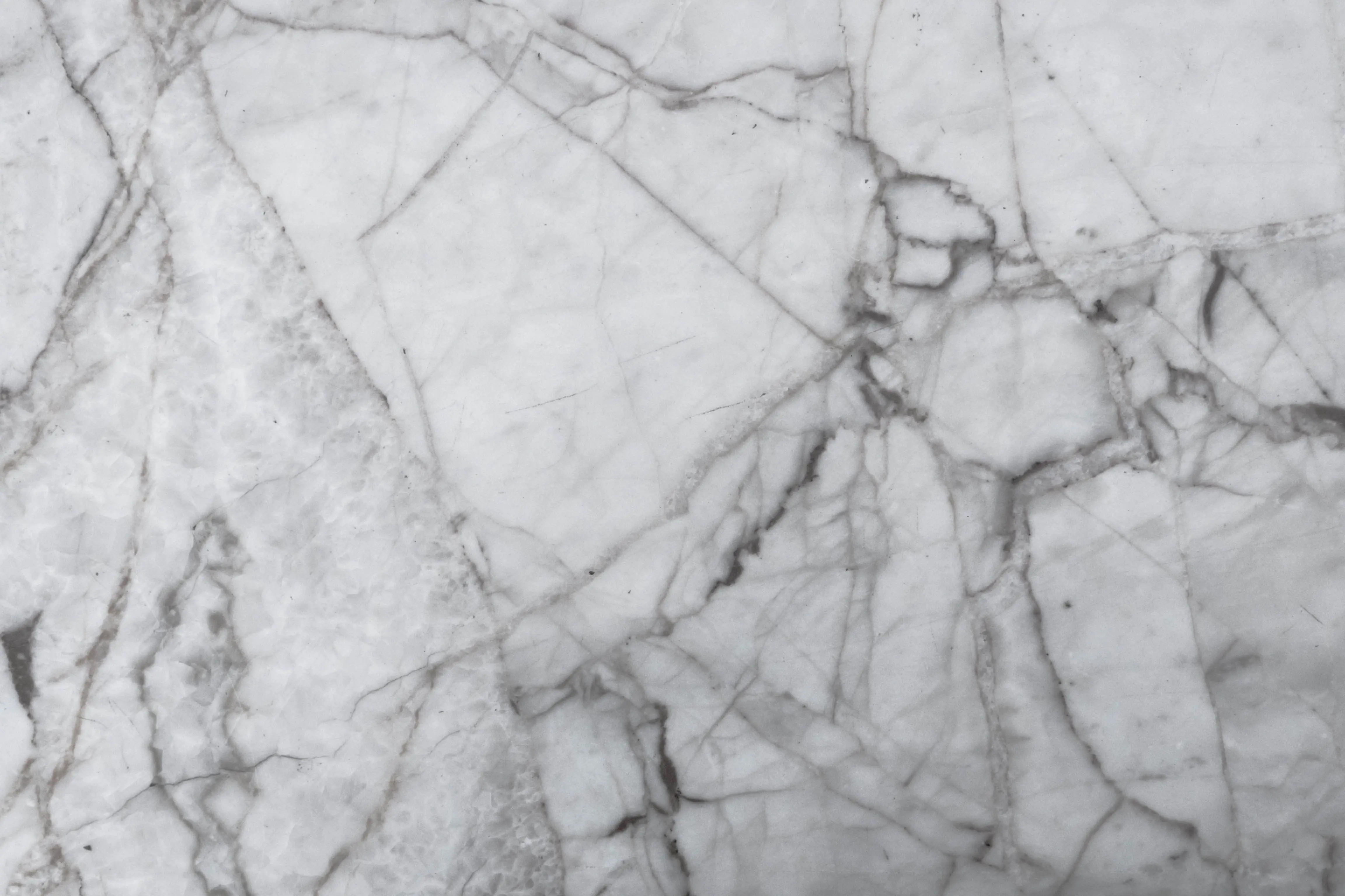 modern kitchen backsplash High-resolution image of textured marble surface with natural patterns, perfect for design and architecture uses.