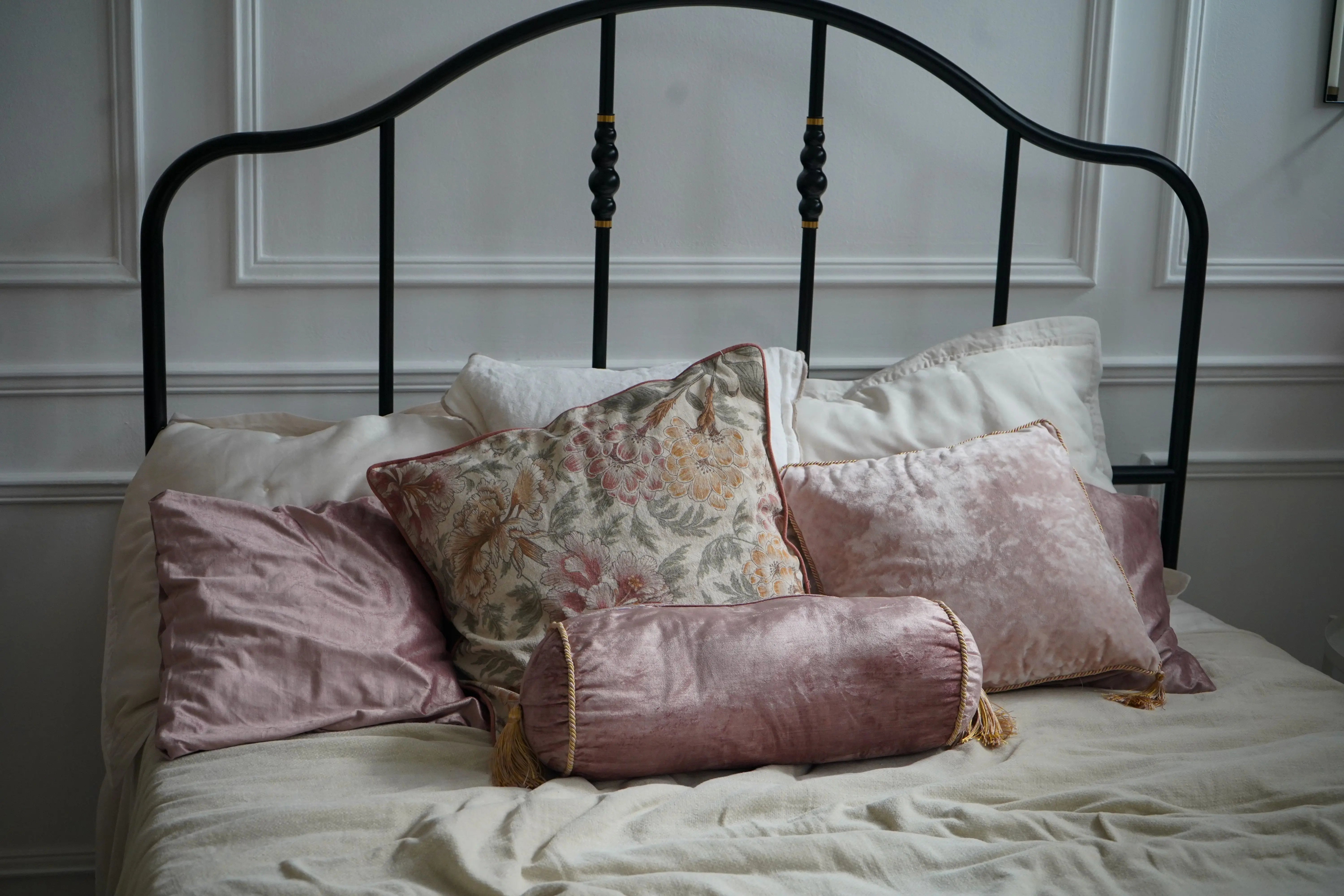 lumbar pillow covers A cozy and elegant bedroom setup featuring decorative cushions and a classic bed.