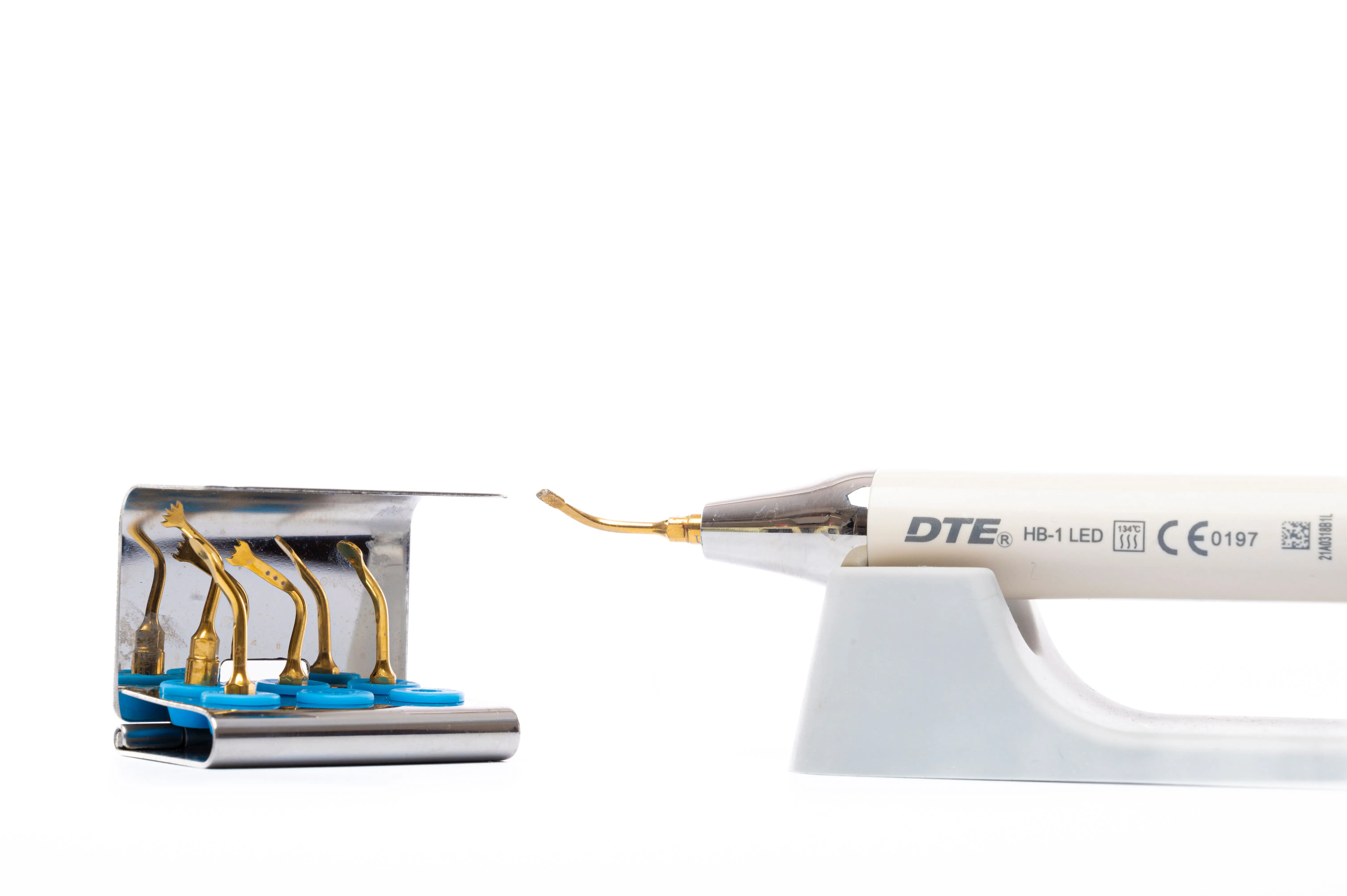 how to get grass stains out Close up of a dental ultrasonic scaler tool with multiple insert tips for dental hygiene.