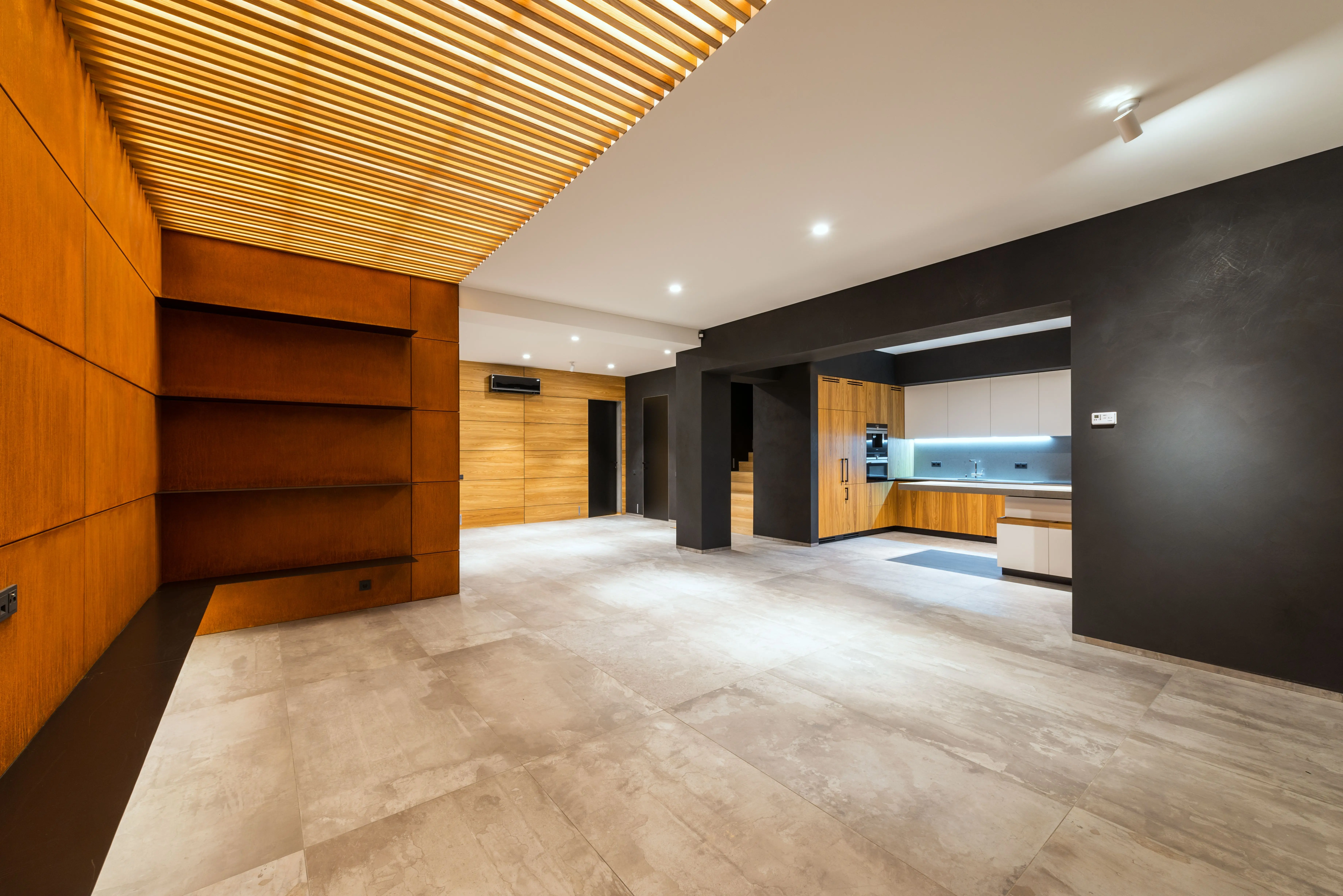 luxury home renovations Bright empty modern interior with wooden accents and minimal design, perfect for new home decor.