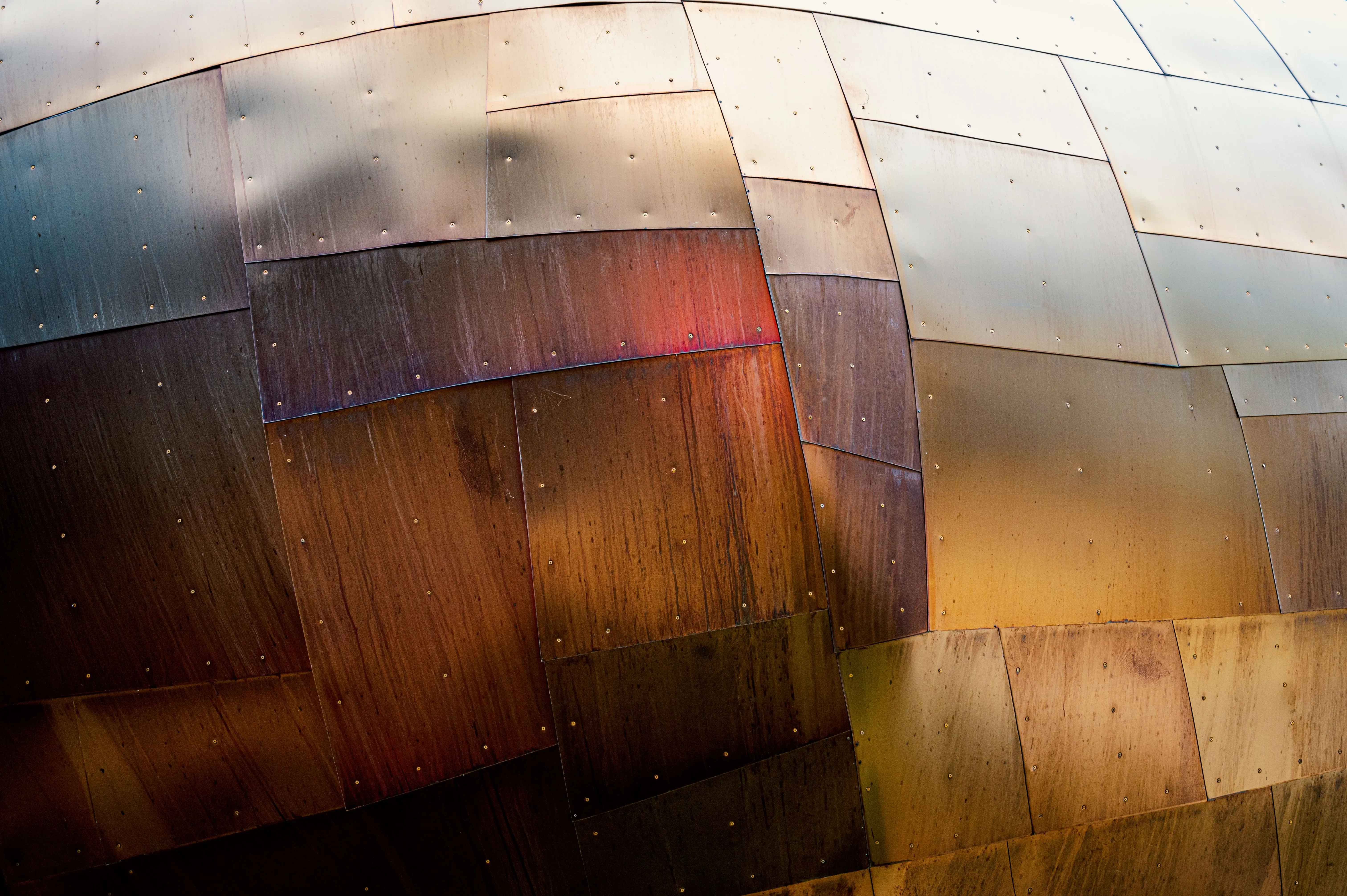 outdoor wall decorations metal Detailed view of the colorful metal facade of the Museum of Pop Culture in Seattle.