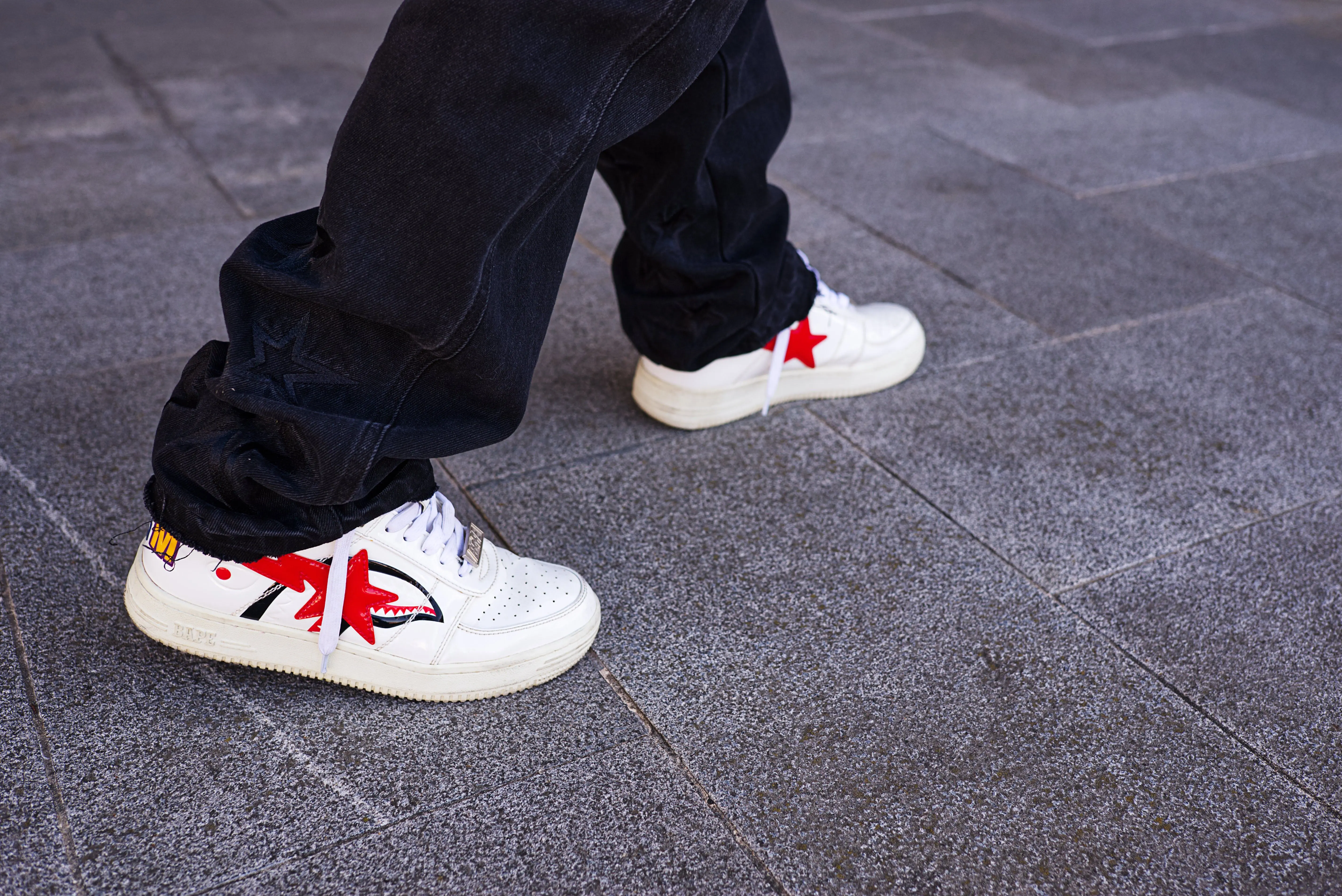 house siding ideas Fashionable sneakers walking on urban pavement. A modern take on street style and footwear trends.