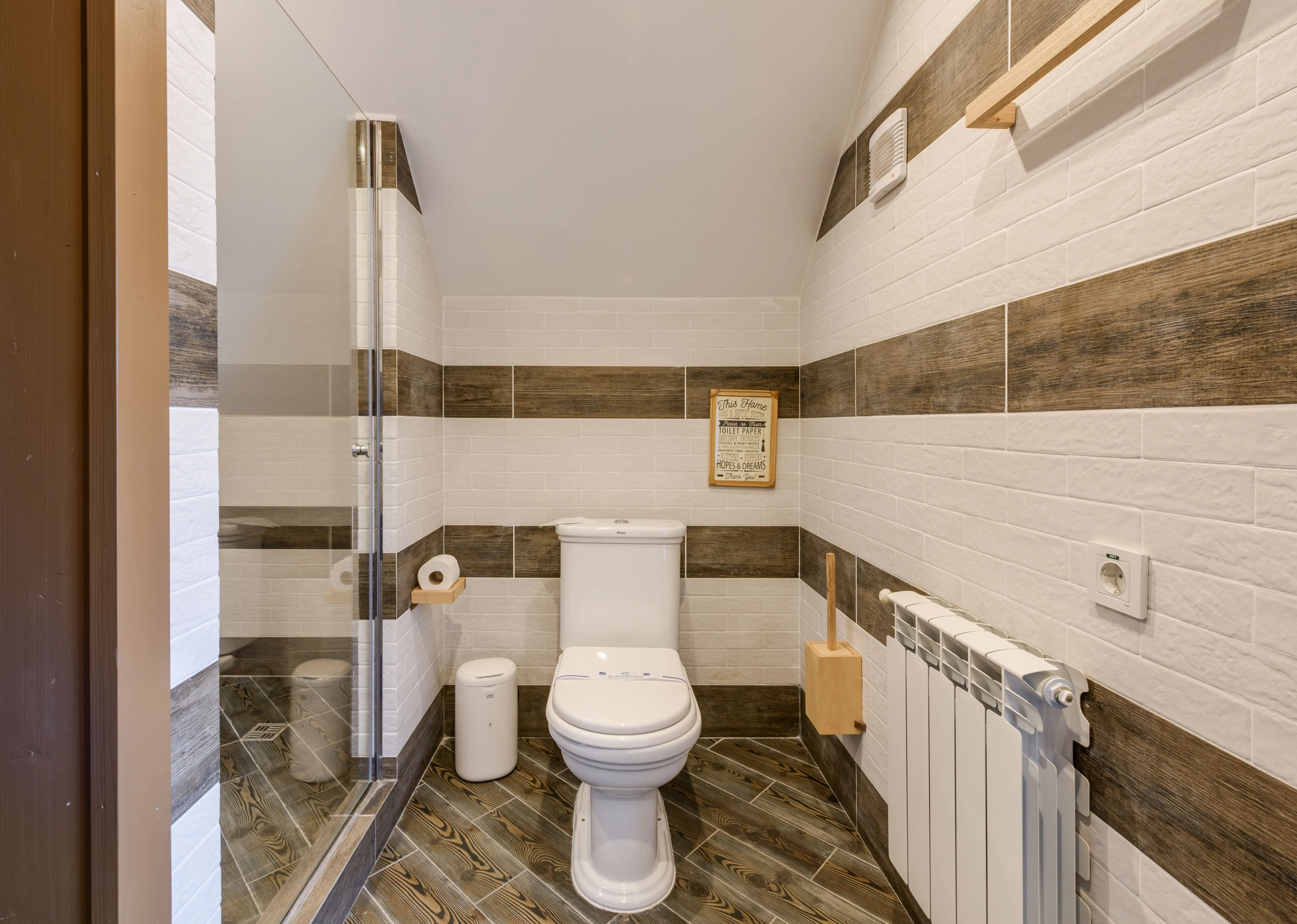 small master bathroom designs Minimalistic bathroom with clean white tiles and modern fixtures.