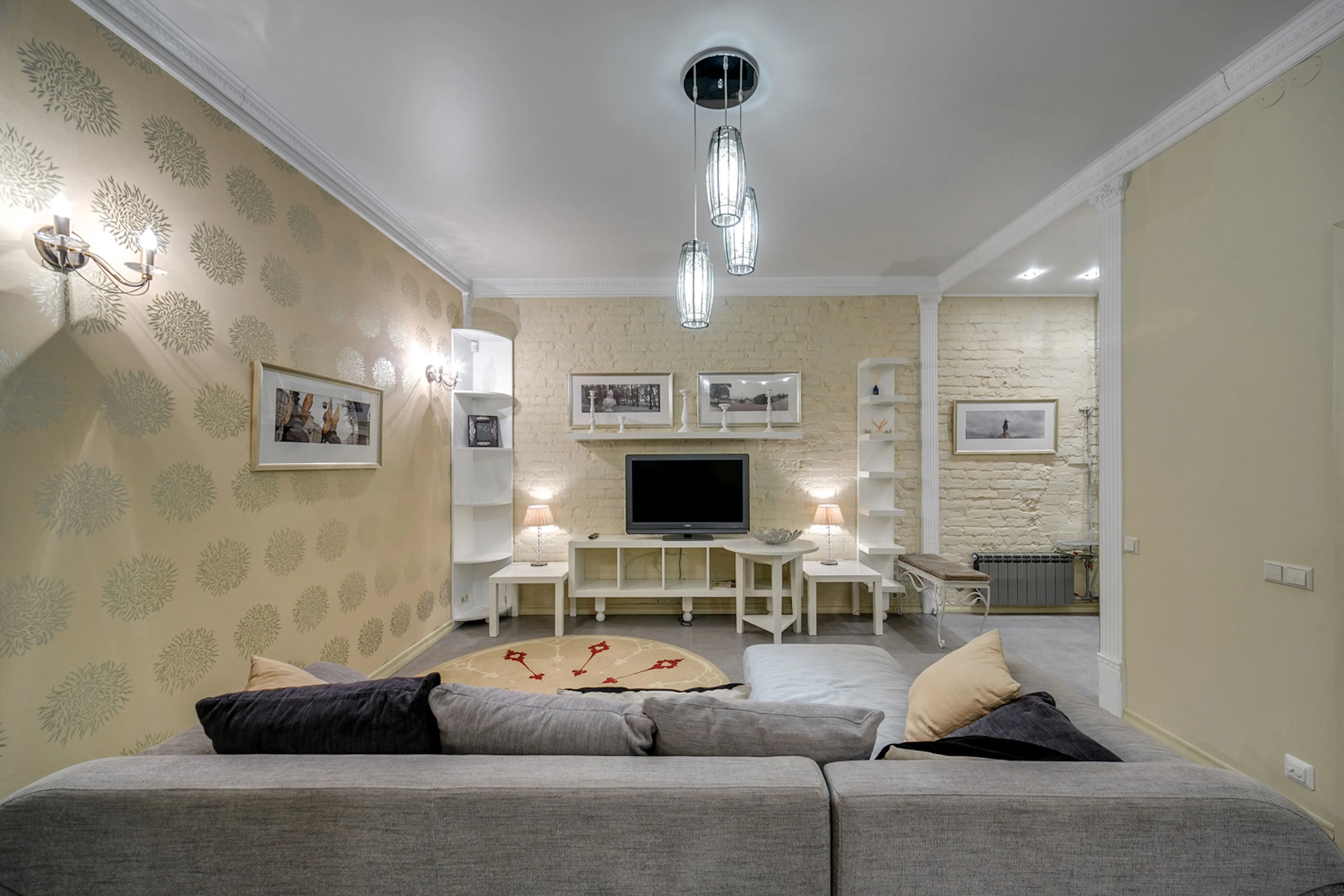 secondary furniture grouping Elegant living room featuring modern decor, neutral tones, and ambient lighting.