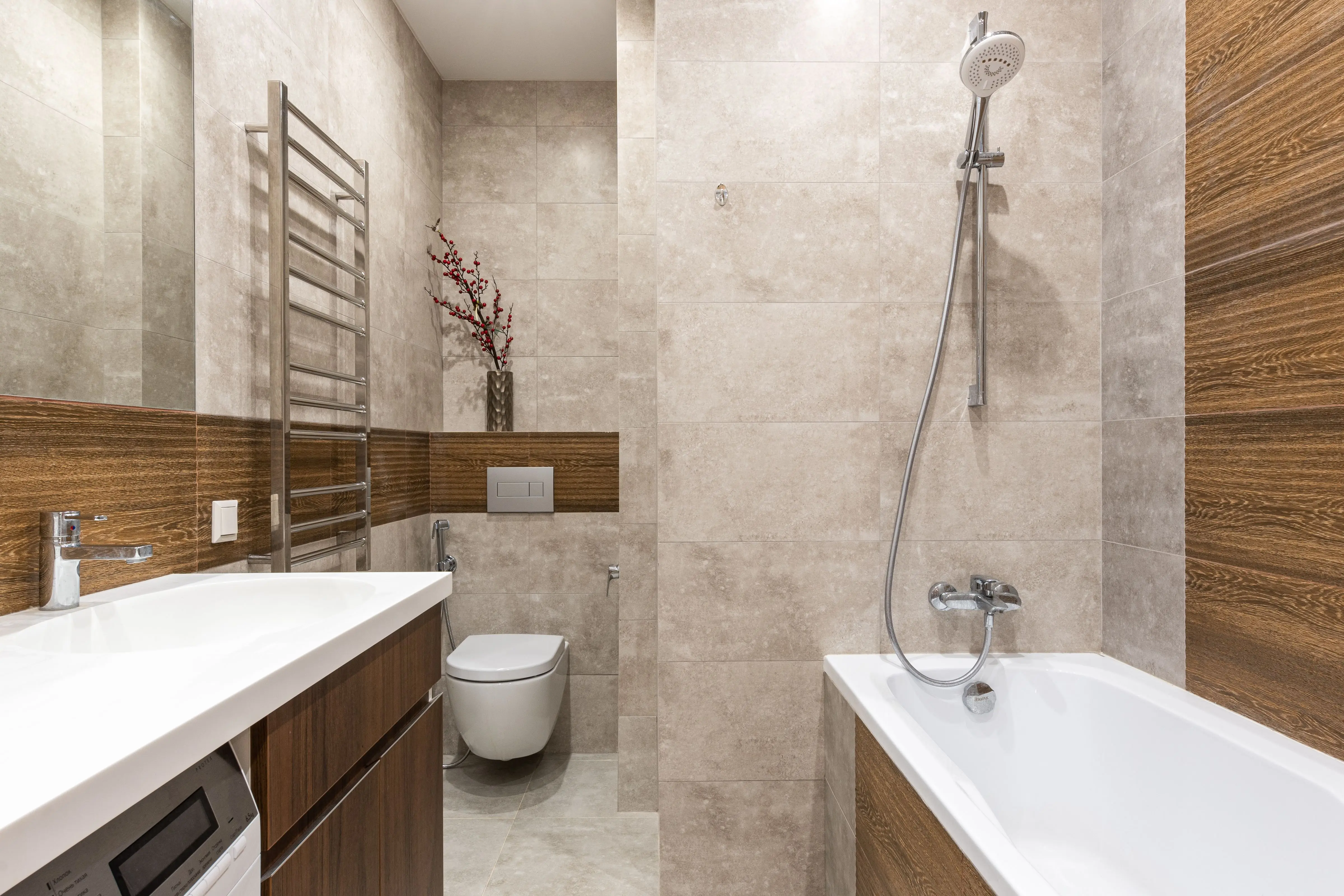 tub inside shower Sleek bathroom design featuring a bathtub, shower, and modern fixtures.