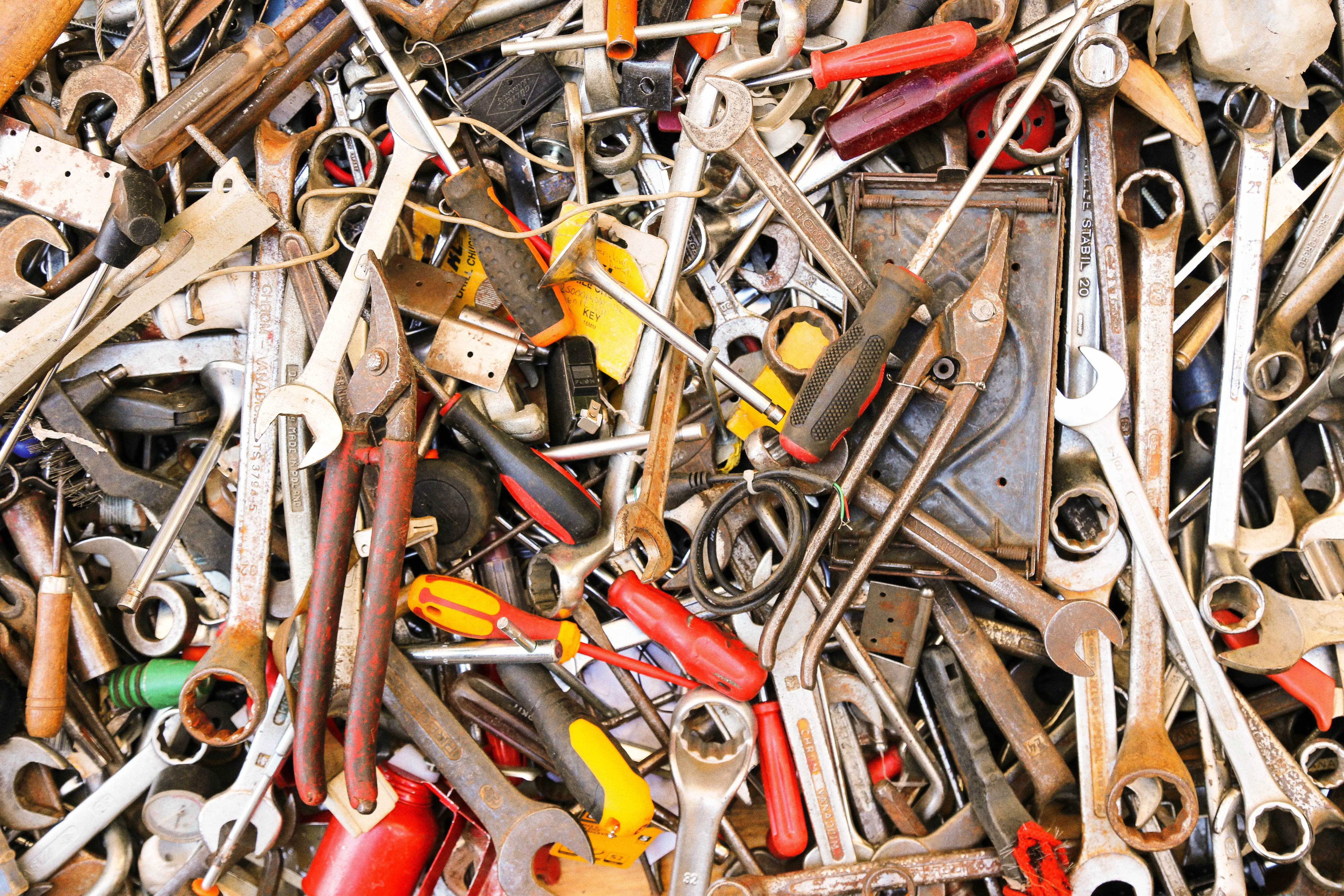 diy outdoor fireplace A vibrant assortment of various hand tools arranged in a pile. Ideal for construction themes.