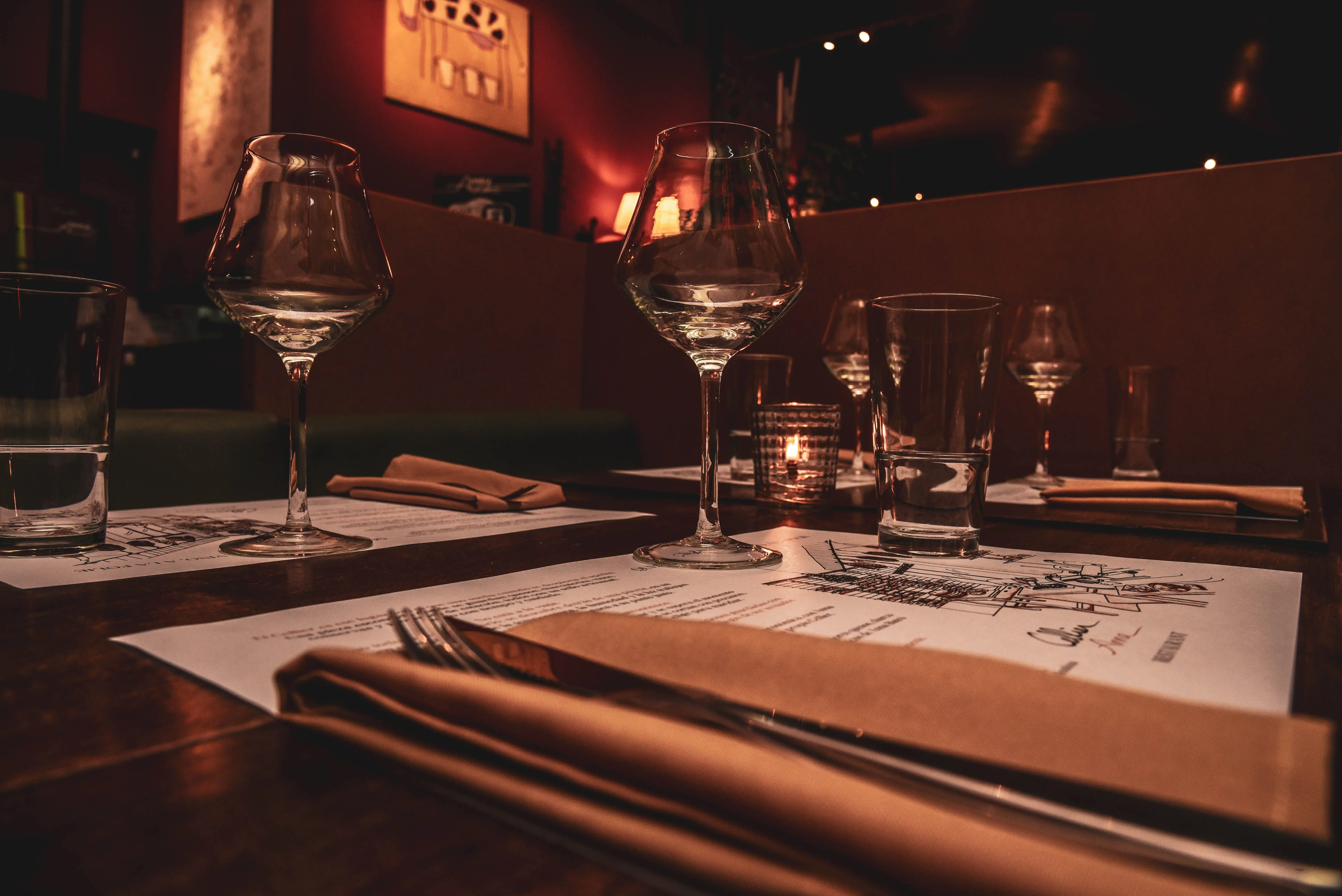 extension dining table Romantic restaurant setting with candlelight and elegant tableware, perfect for fine dining ambience.