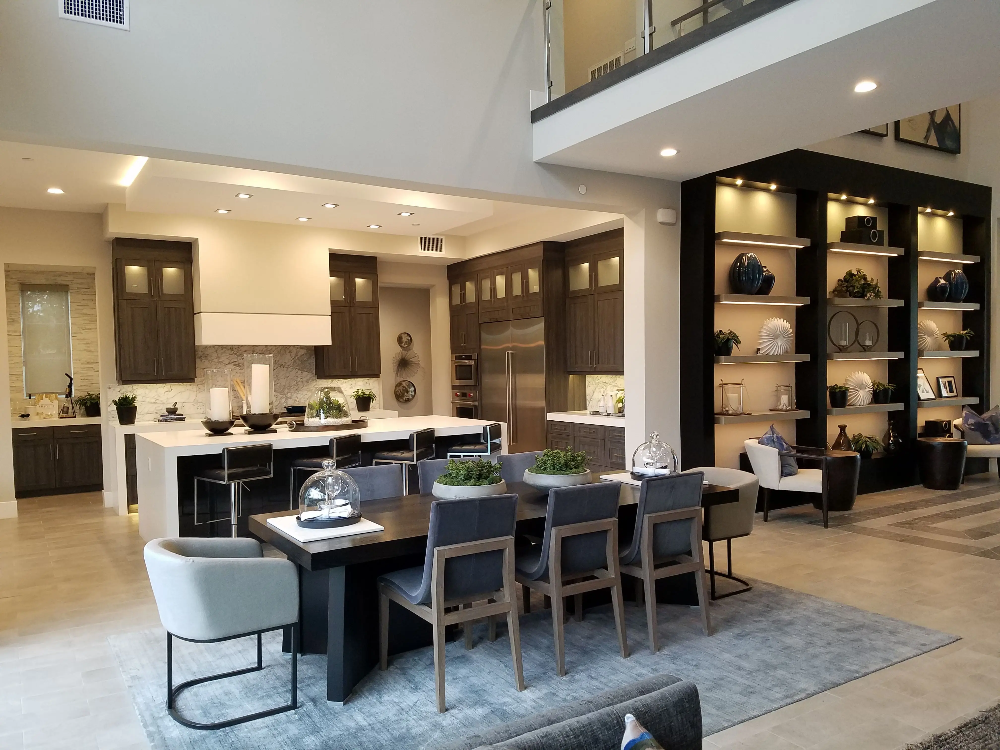 extension table Modern open-plan kitchen and dining area in a residential setting in Irvine, CA.