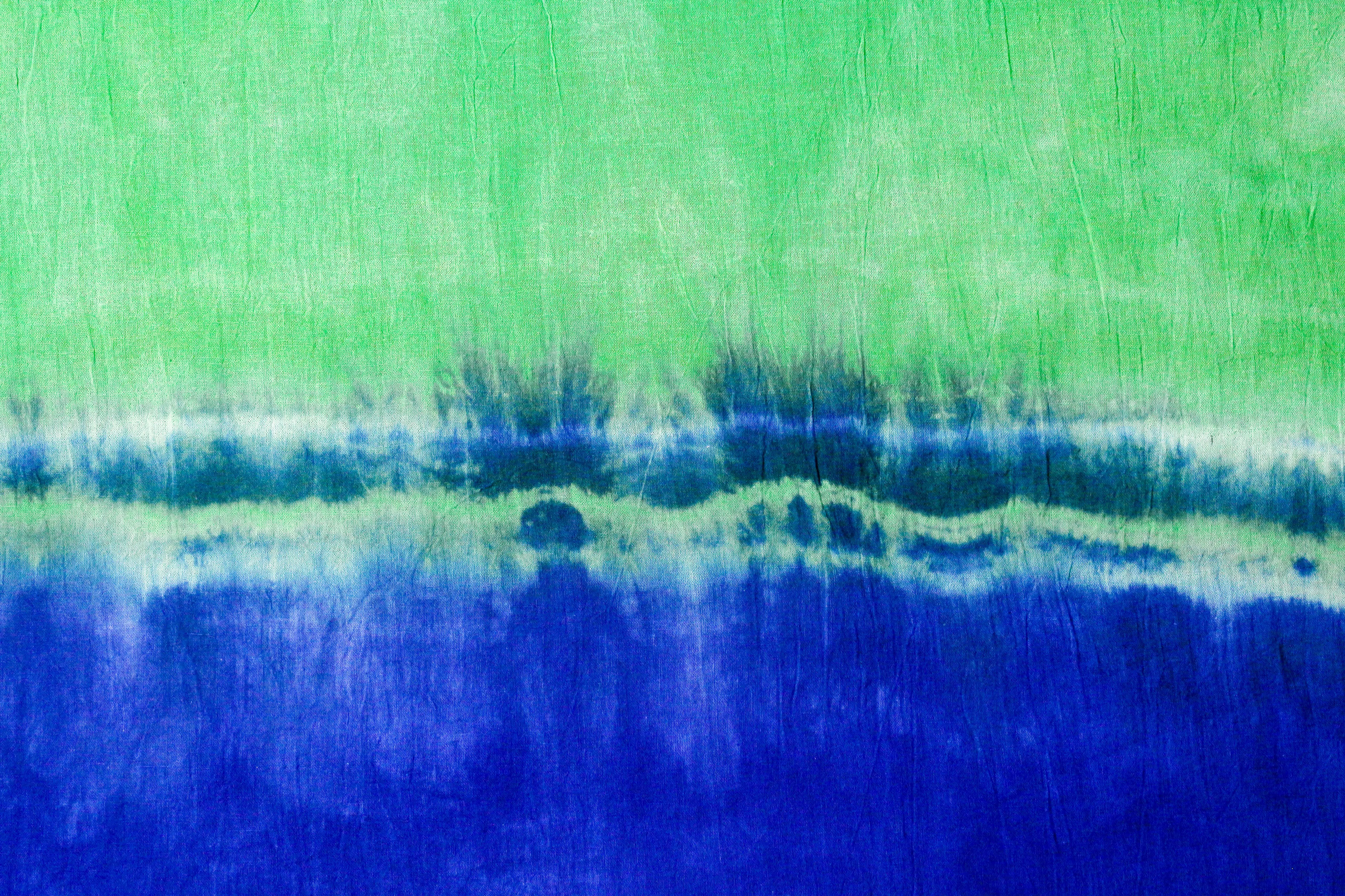 cool tie dye patterns Colorful abstract texture artwork in green and blue hues. Perfect for creative backgrounds.
